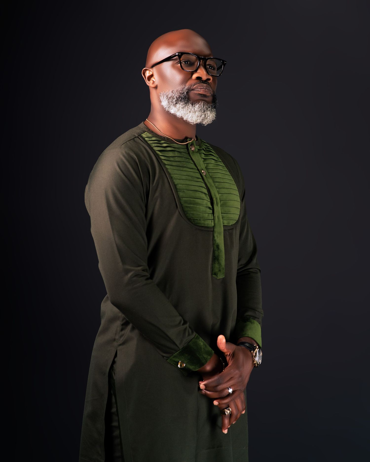 Elegant olive green formal wear with detailed pleating shown from multiple angles.