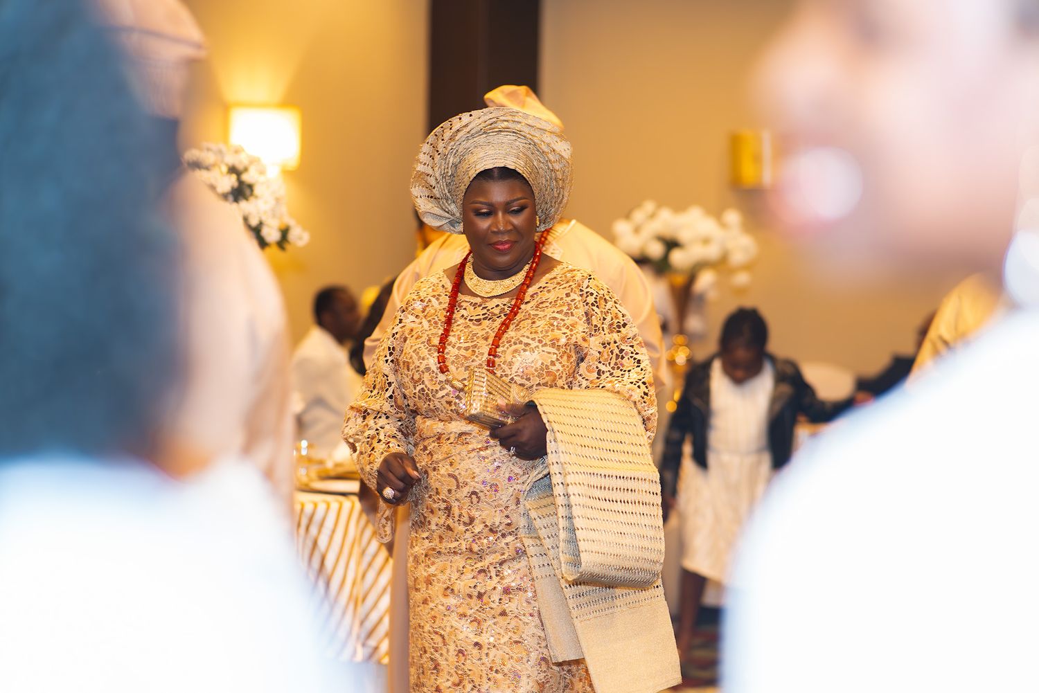 Festive wedding reception showing traditional Nigerian cultural celebrations and dancing.
