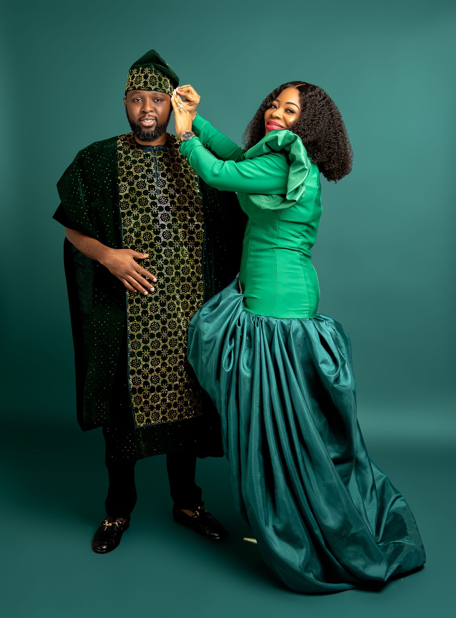 Elegant poses showcasing a green gown and patterned traditional wear against a teal background.