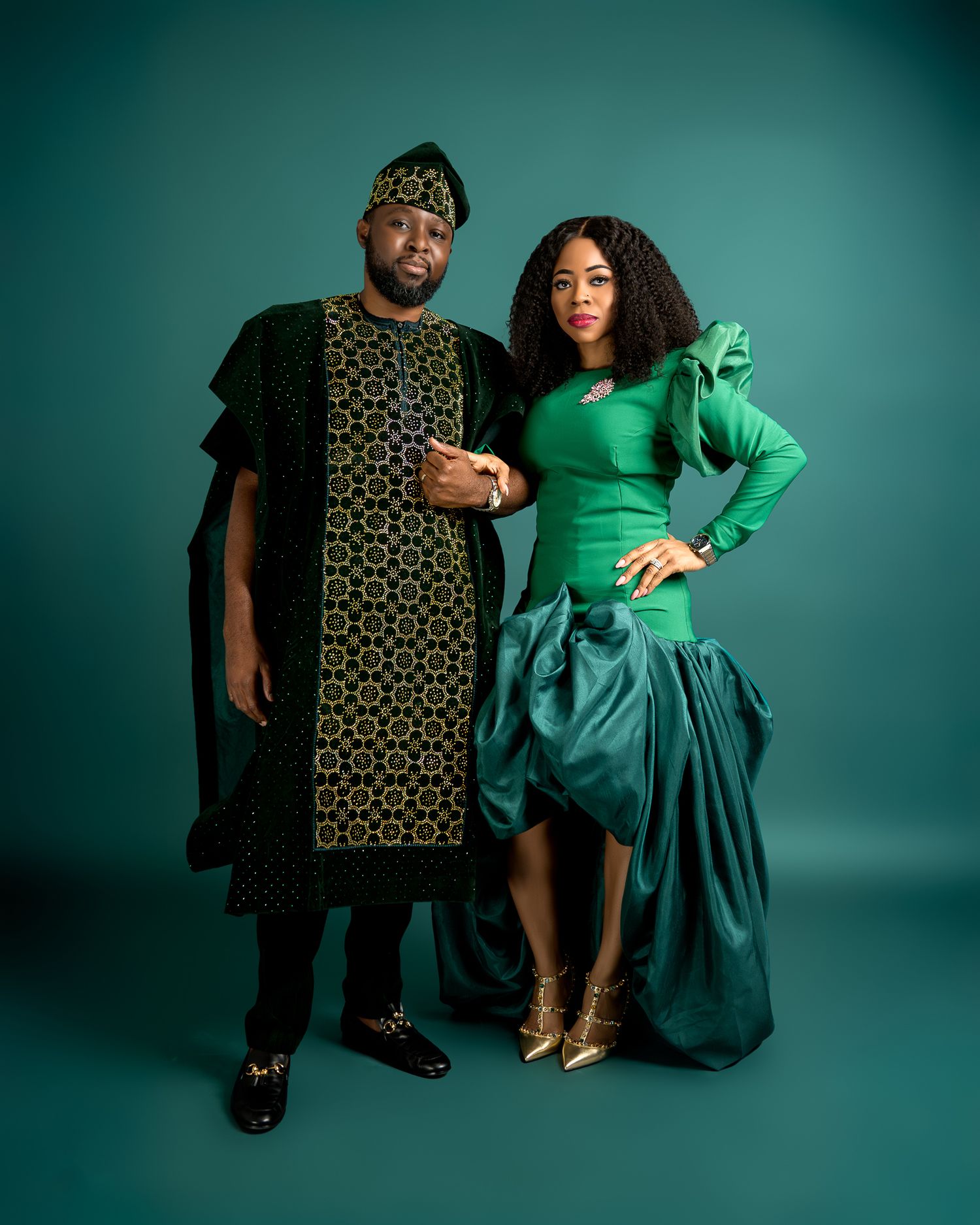 Fashion portraits combining modern green dress with traditional patterned clothing.