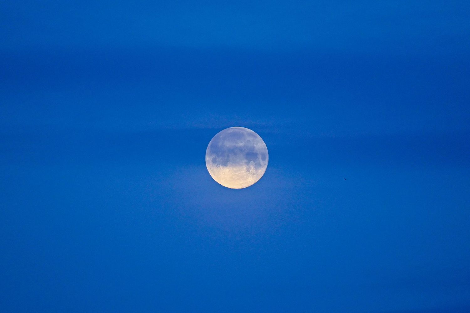 Full moon during blue hour as moon photography available as fine art wall prints.