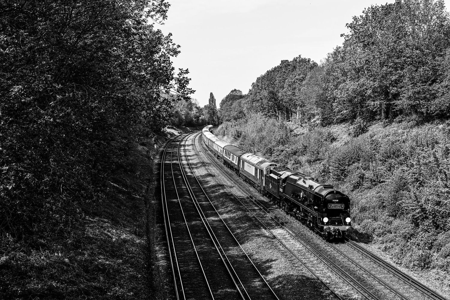 Clan Line 35028 steam locomotive passing through St Mary Cray area as scenic railway photography is available as fine art wall prints.