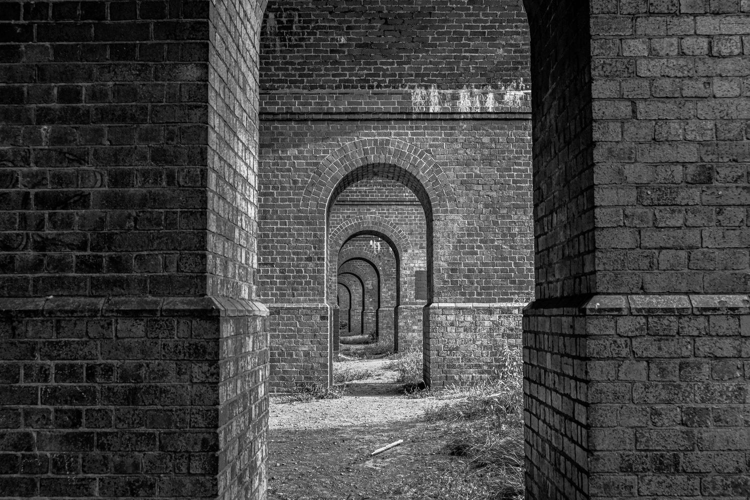 Arnos Viaduct during sunshine as viaduct black & white photography available as fine art prints and gallery frame.