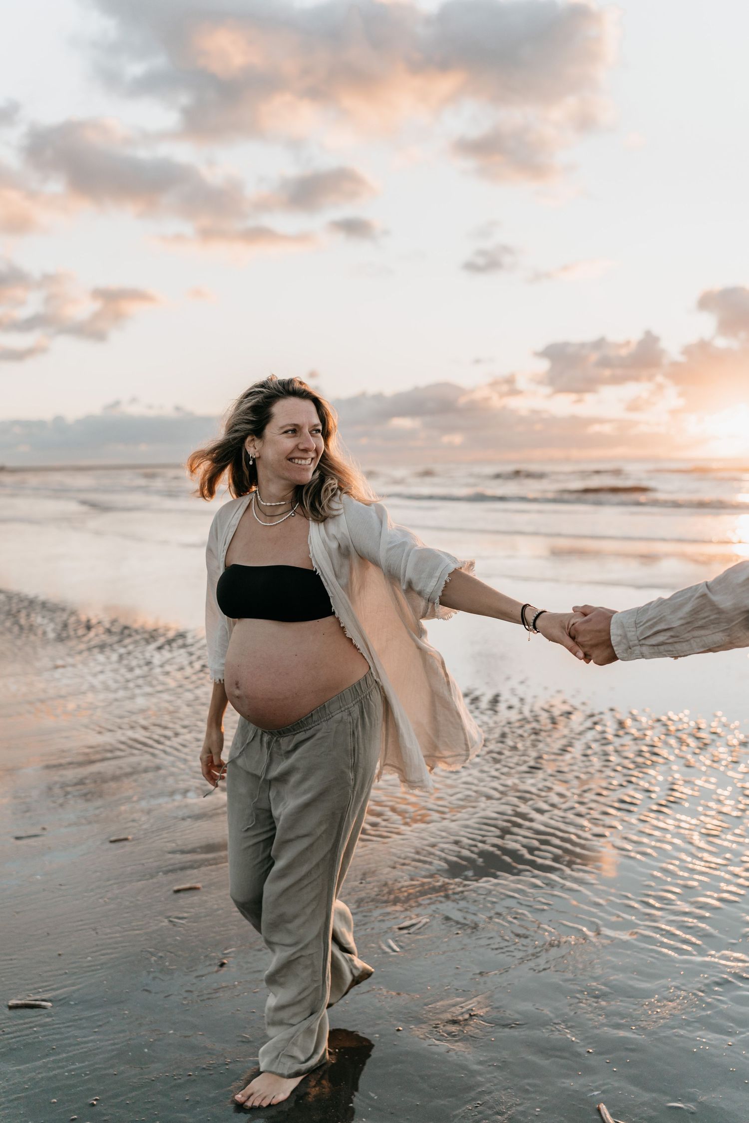 Pregnant beachgirl at the beach photo