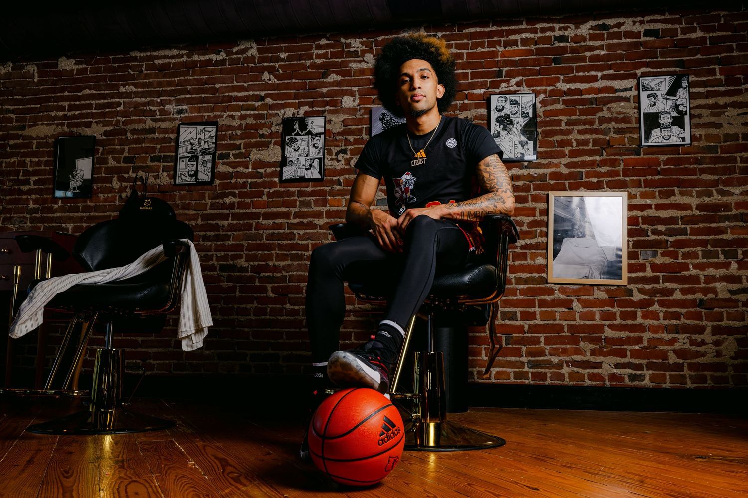 Chucky Hepburn Black History Month studio shoot, shot by Chris Carter / University of Louisville Athletics.