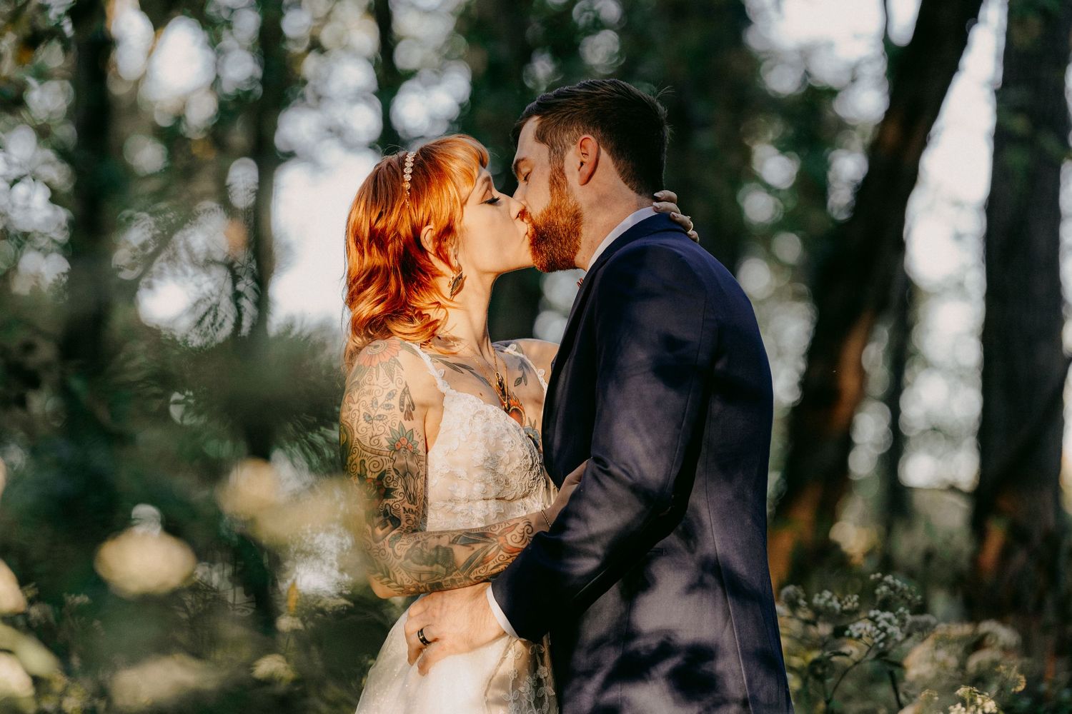Series of romantic wedding portraits with gentle kisses in a wooded outdoor setting.