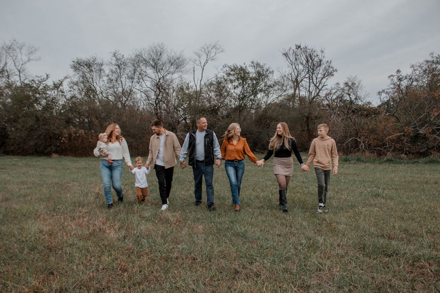Kennesaw Georgia family photographer candid family laughing outdoors
Atlanta GA family session natural light smiling family documentary