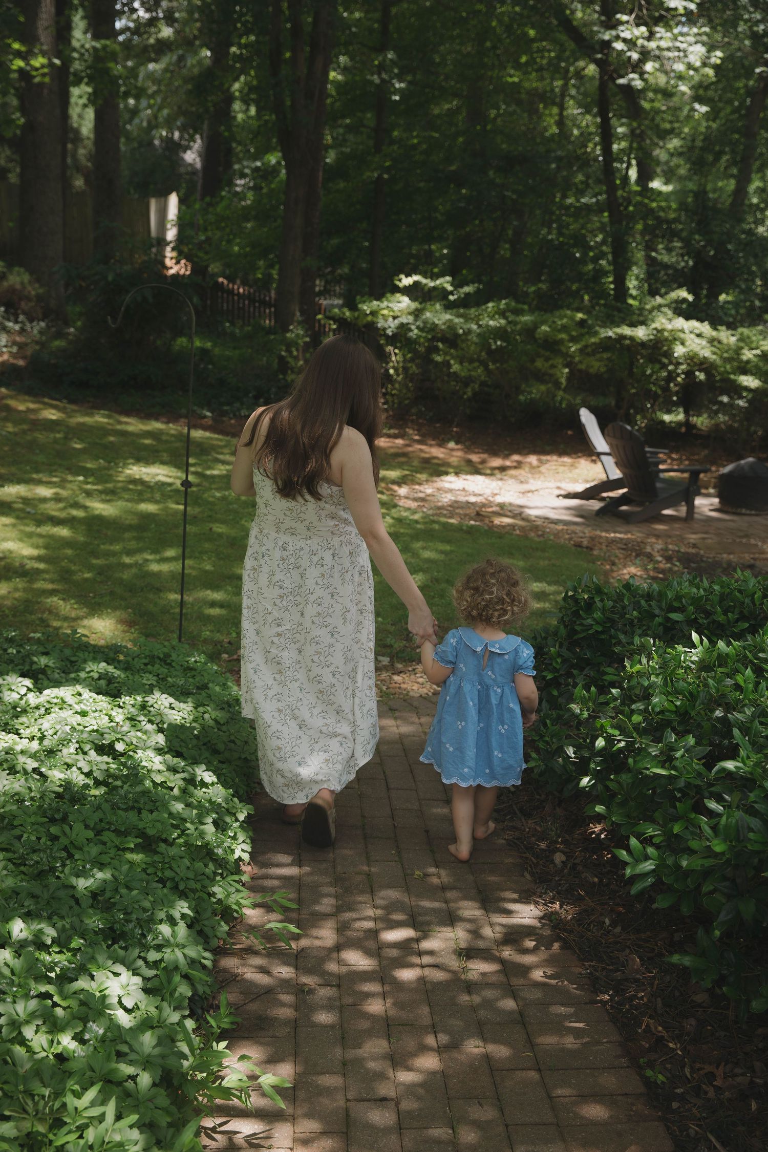 Kennesaw Georgia family photographer candid family laughing outdoors
Atlanta GA family session natural light smiling family documentary