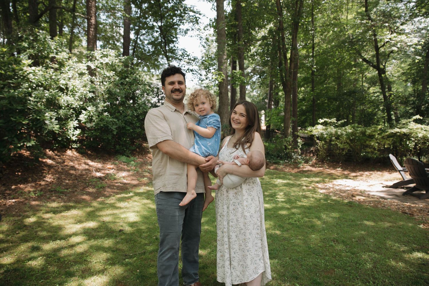 Kennesaw Georgia family photographer candid family laughing outdoors
Atlanta GA family session natural light smiling family documentary