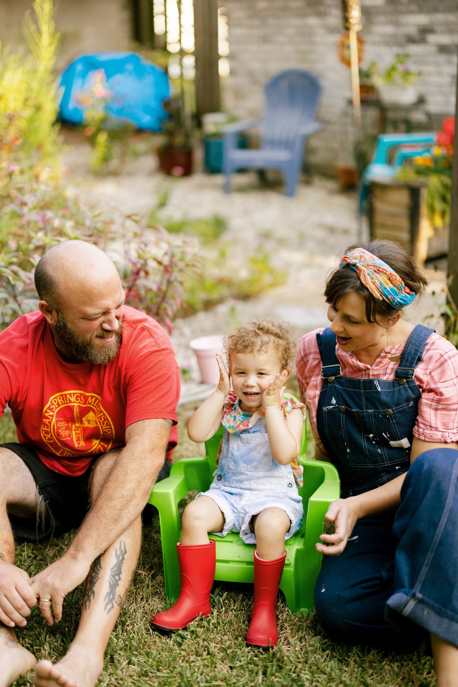 A series of playful moments on grass showing companionship and laughter in casual outdoor setting.