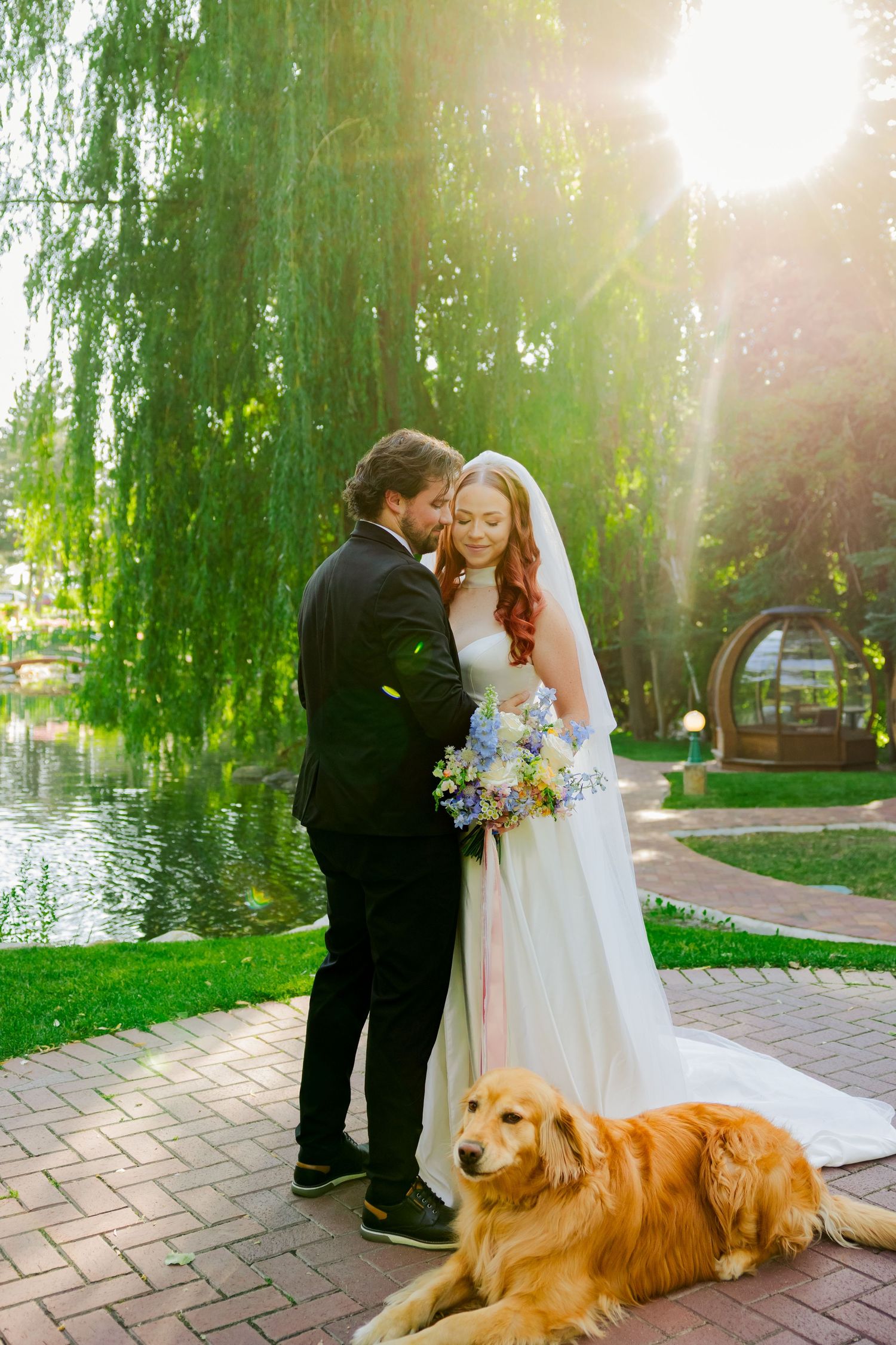 Bride and groom with dog at La Caille photography by Av Potter Photo a Utah wedding and lifestyle photographer