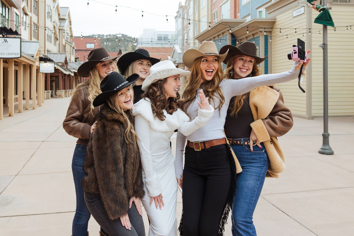 Bachelorette weekend at Park City Main Street, Utah in winter photography by Av Potter Photo a Utah wedding and lifestyle photographer