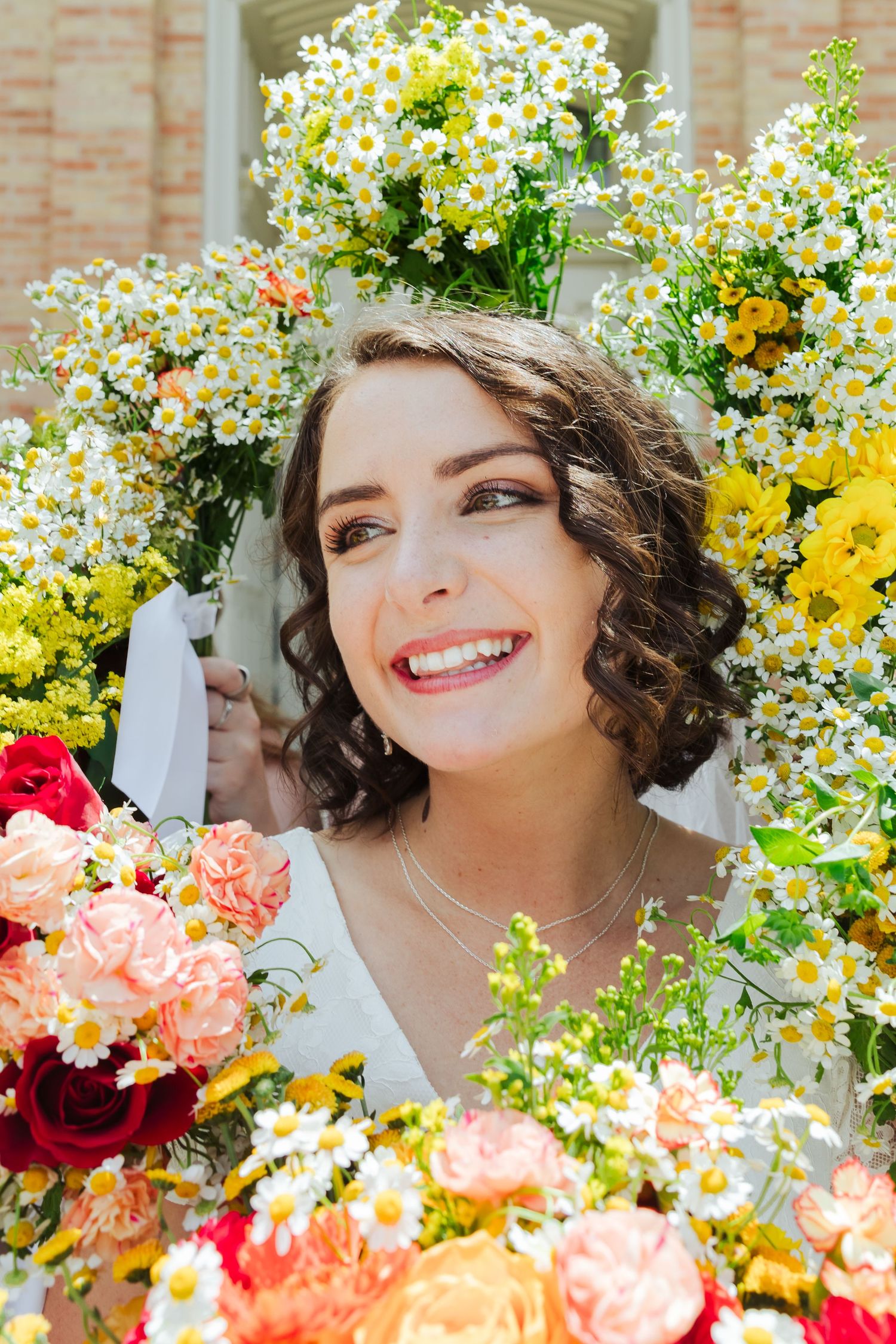 Bride in flowers at The Provo Temple photography by Av Potter Photo a Utah wedding and lifestyle photographer