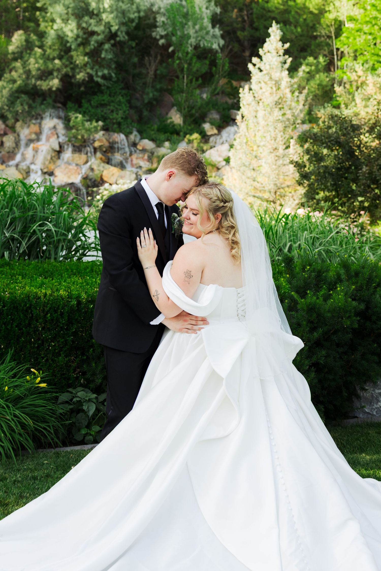 Bride and Groom at Millennial Falls photography by Av Potter Photo a Utah wedding and lifestyle photographer