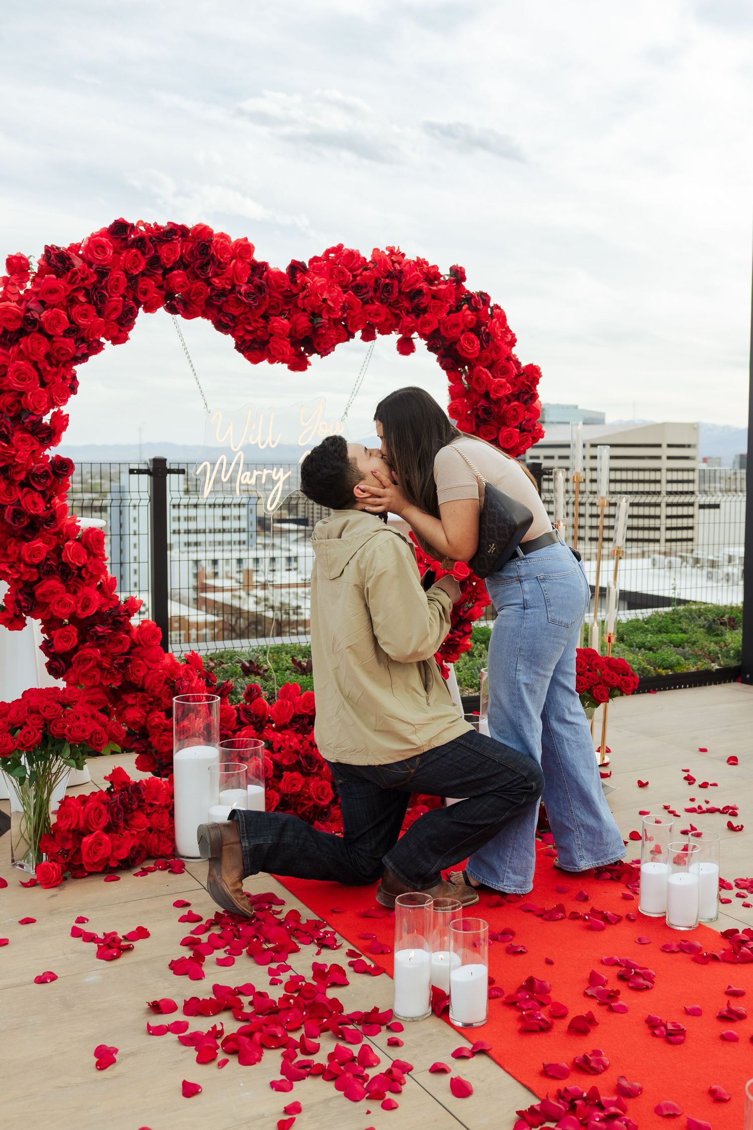 Proposal on rooftop in Downtown Salt Lake City, Utah photography by Av Potter Photo a Utah wedding and lifestyle photographer