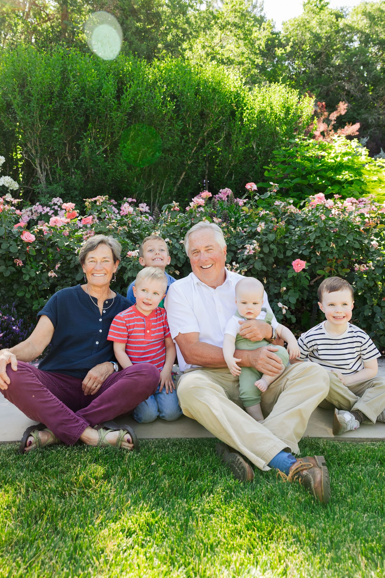 Family during summer at The Red Butte Gardens photography by Av Potter Photo a Utah wedding and lifestyle photographer