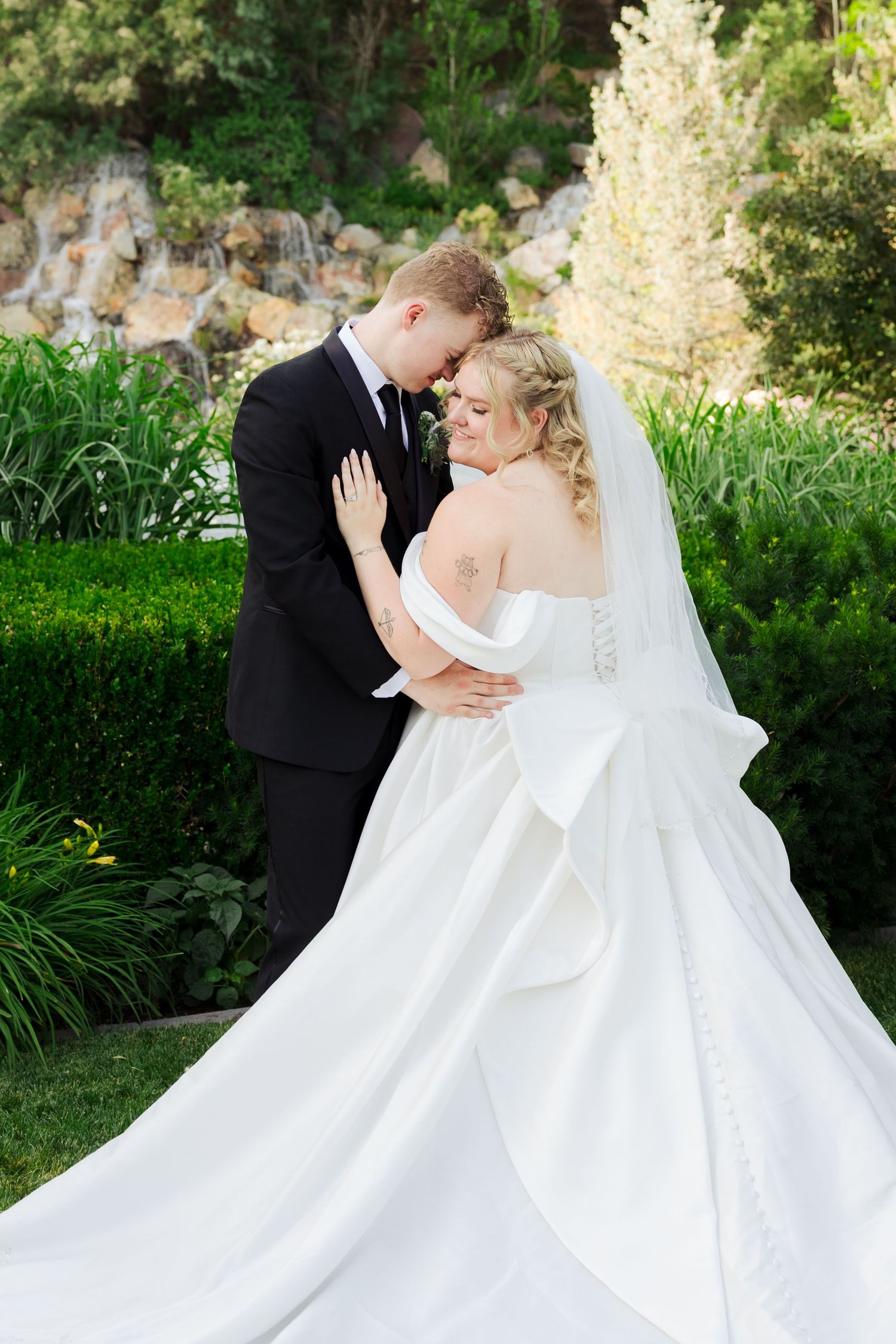 Bride and groom at Millennial Falls photography by Av Potter Photo a Utah wedding and lifestyle photographer