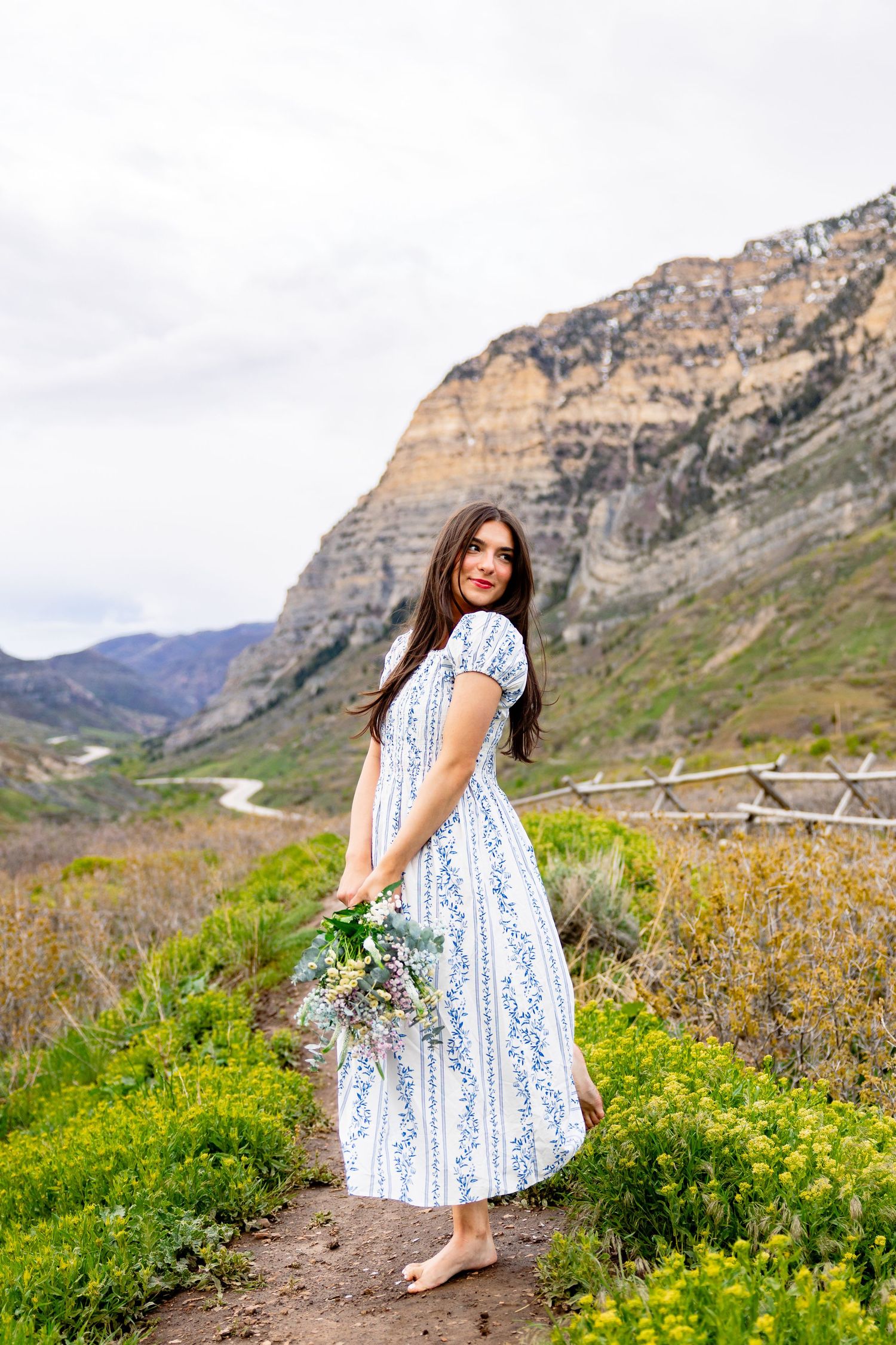 Senior girl in field at Kyhv Peak in Provo photography by Av Potter Photo a Utah wedding and lifestyle photographer