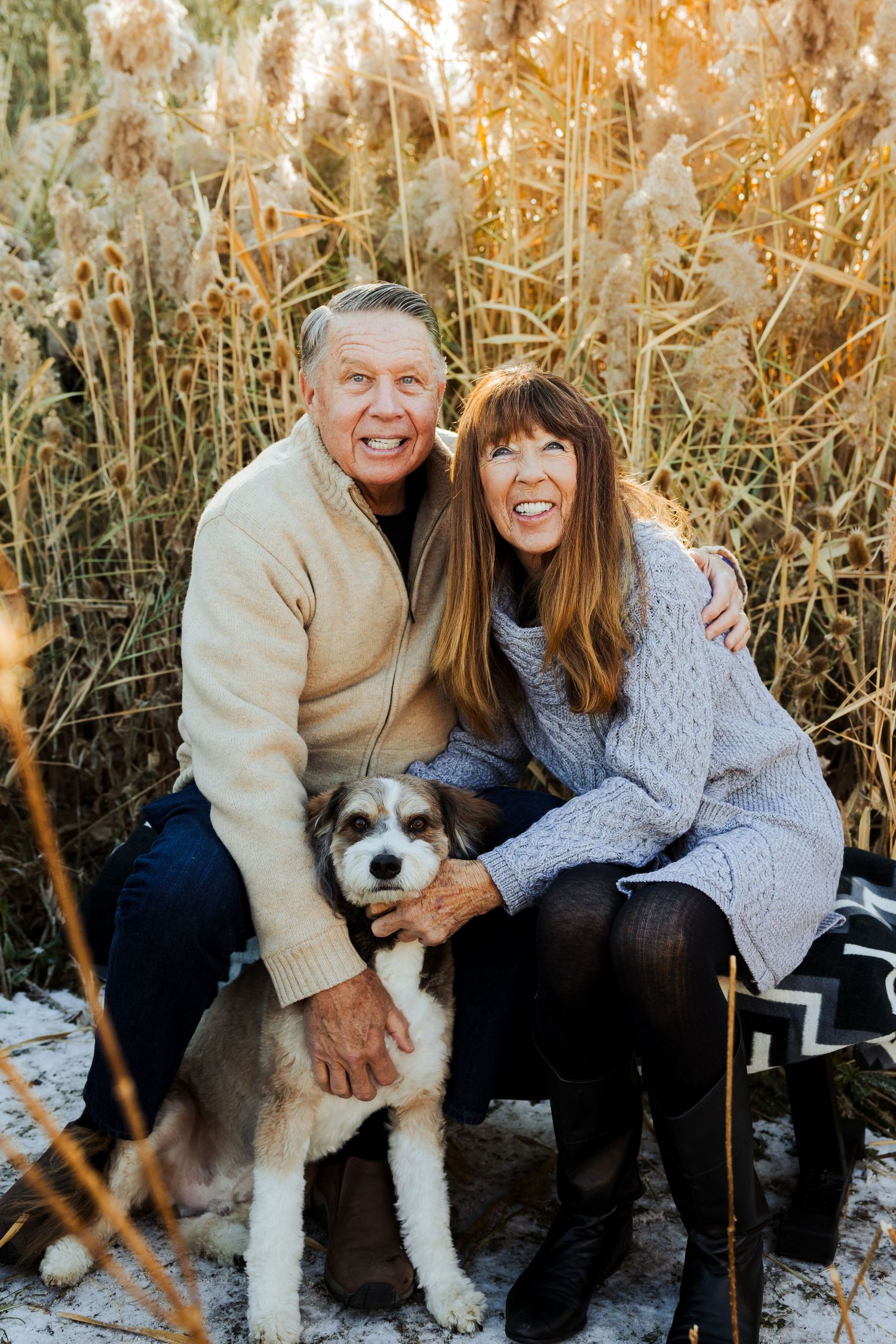 Older couple with dog during winter at Tunnel Springs Park photography by Av Potter Photo a Utah wedding and lifestyle photographer