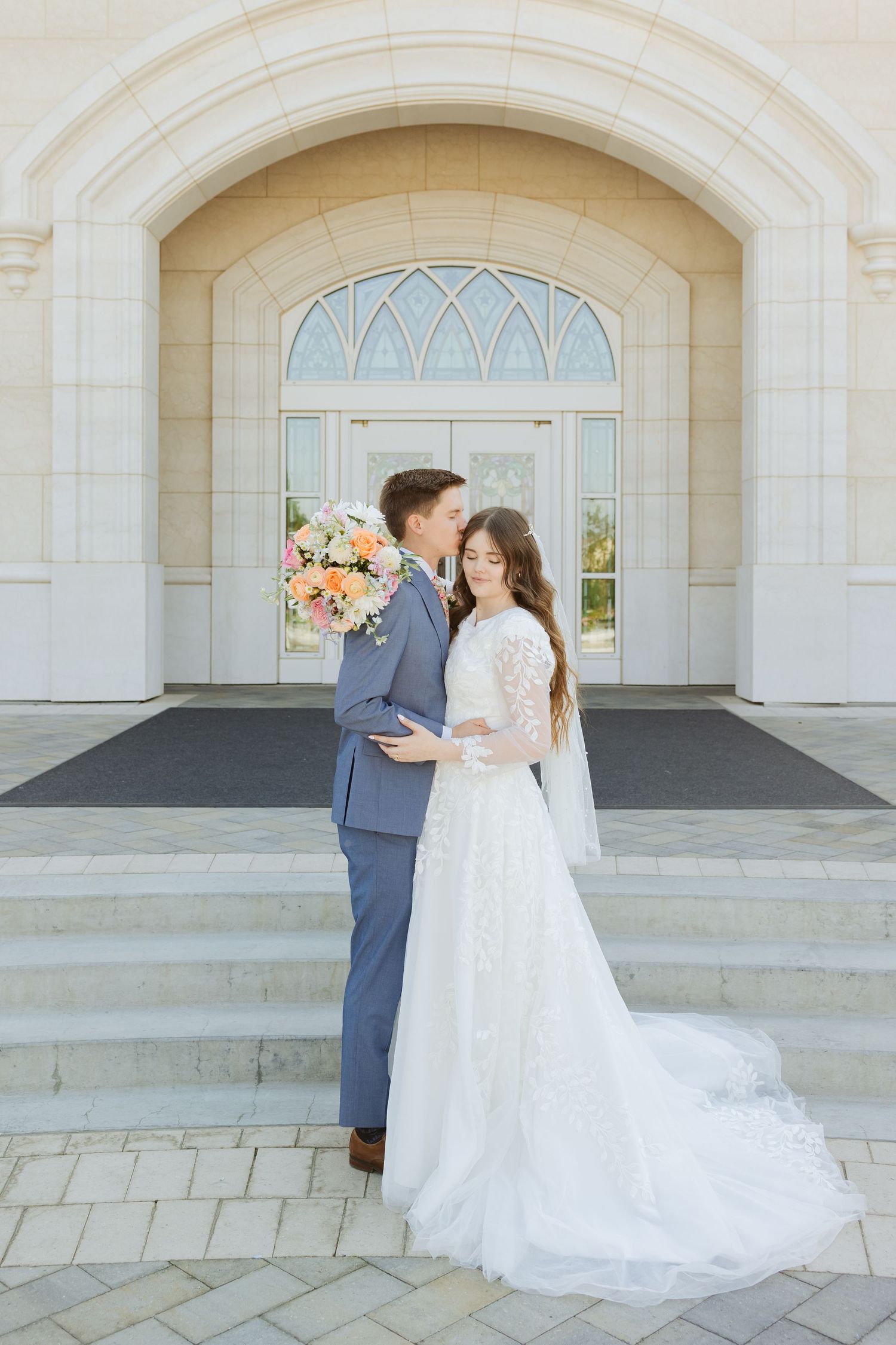 Bride and groom at the Taylorsville Temple photography by Av Potter Photo a Utah wedding and lifestyle photographer