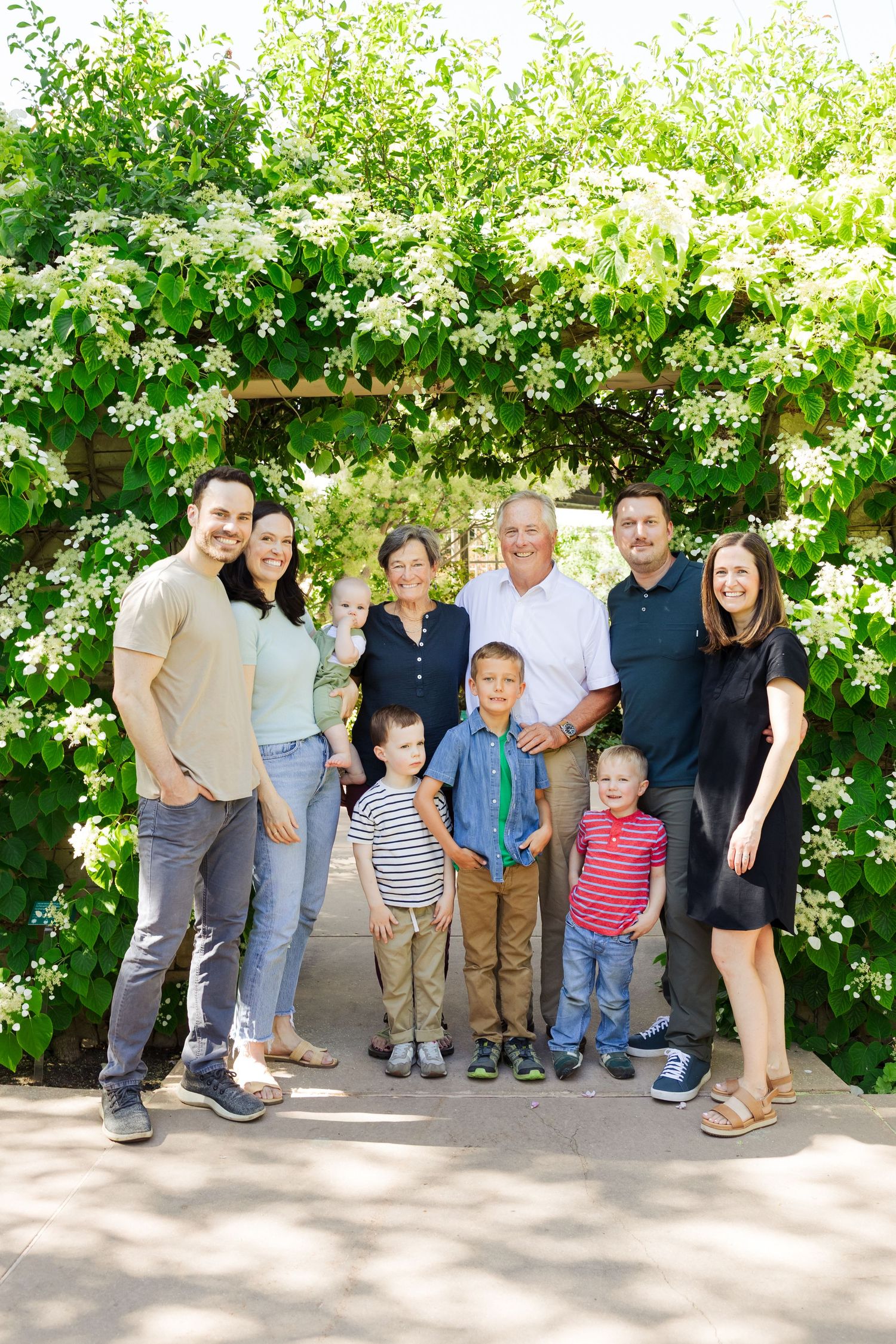 Family during summer at The Red Butte Gardens photography by Av Potter Photo a Utah wedding and lifestyle photographer