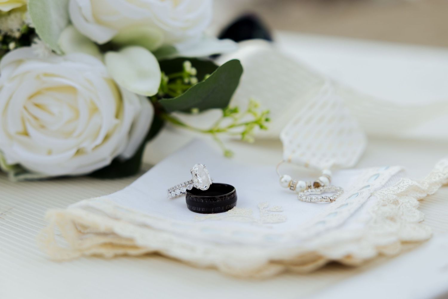 Wedding rings on handkerchief at Echo State Park photography by Av Potter Photo a Utah wedding and lifestyle photographer