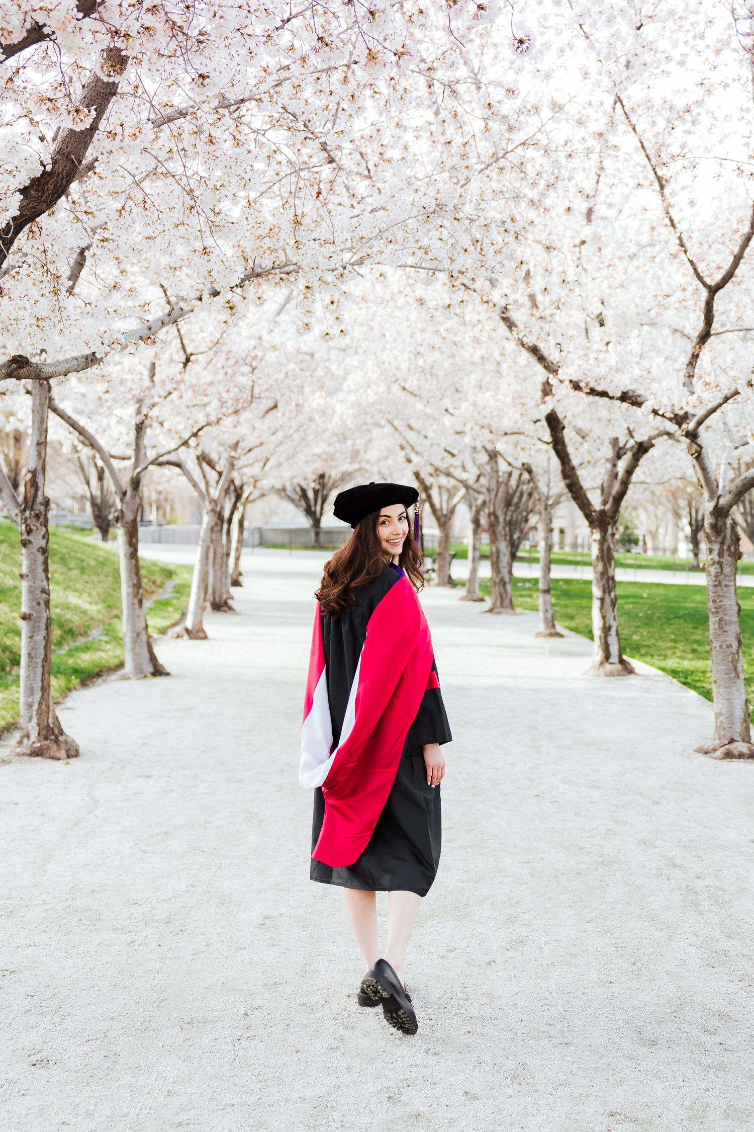 Graduation during cherry blossom season at The Utah State Capitol photography by Av Potter Photo a Utah wedding photographer
