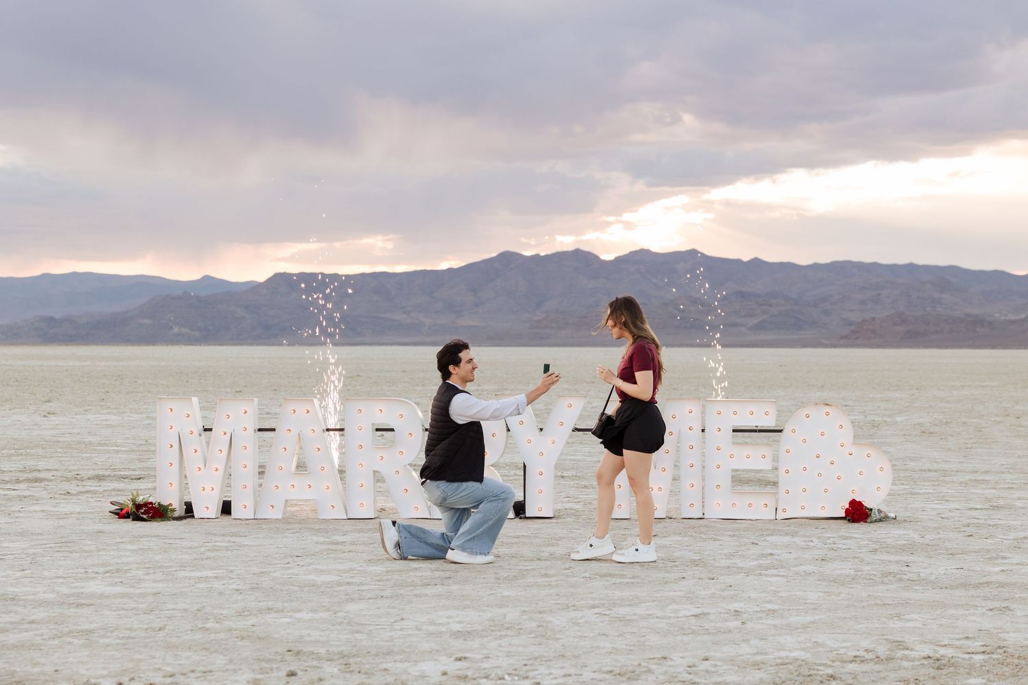 Proposal at The Bonneville Salt Flats photography by Av Potter Photo a Utah wedding and lifestyle photographer