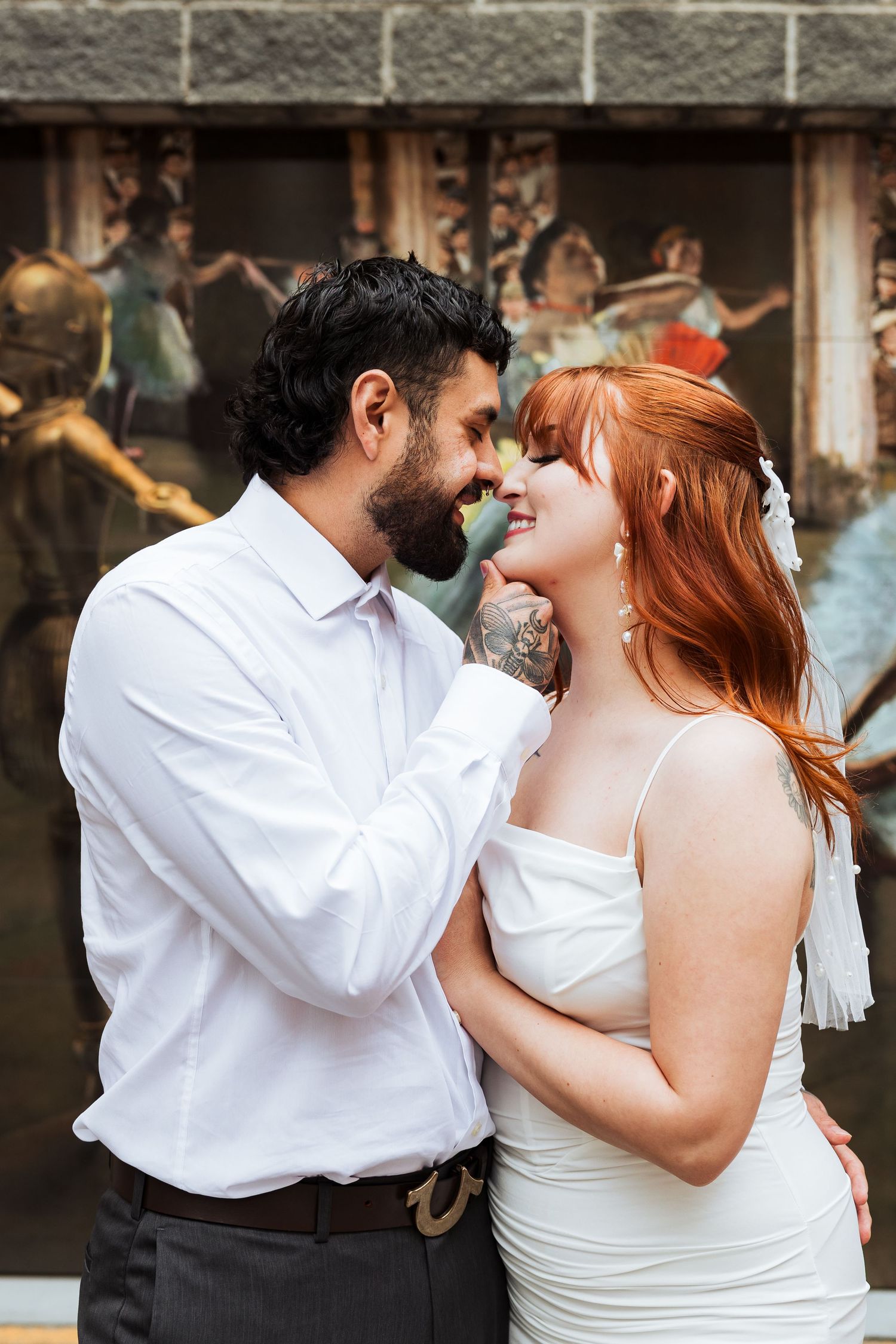 Couple in front of graffiti at Salt Lake City Downtown photography by Av Potter Photo a Utah wedding and lifestyle photographer