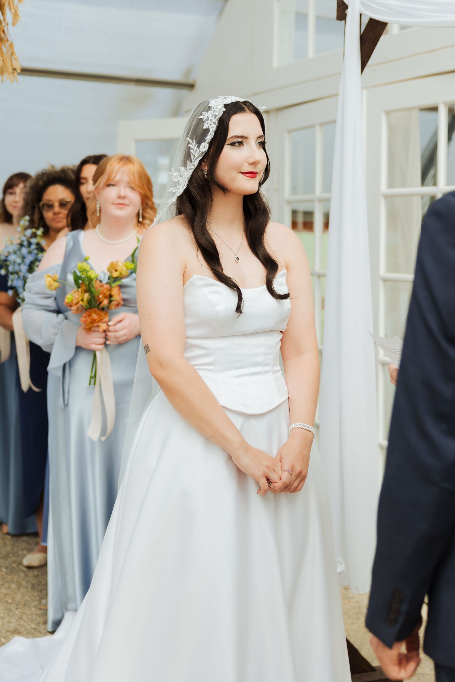 Bride during ceremony at The Kinlands Greenhouse photography by Av Potter Photo a Utah wedding and lifestyle photographer