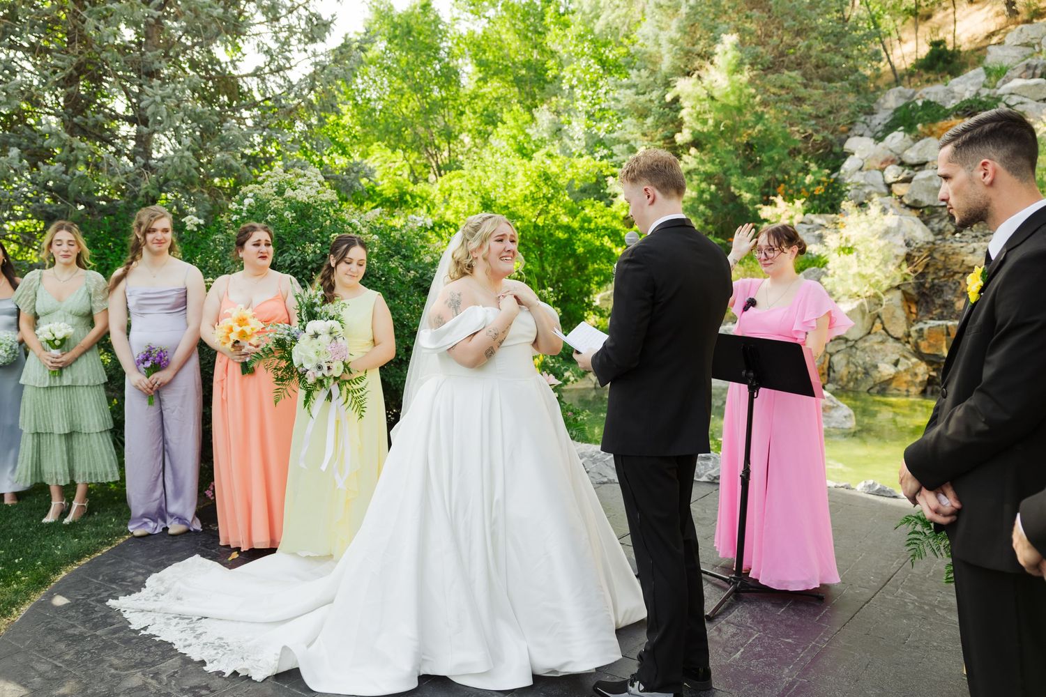 Wedding ceremony at Millennial Falls photography by Av Potter Photo a Utah wedding and lifestyle photographer