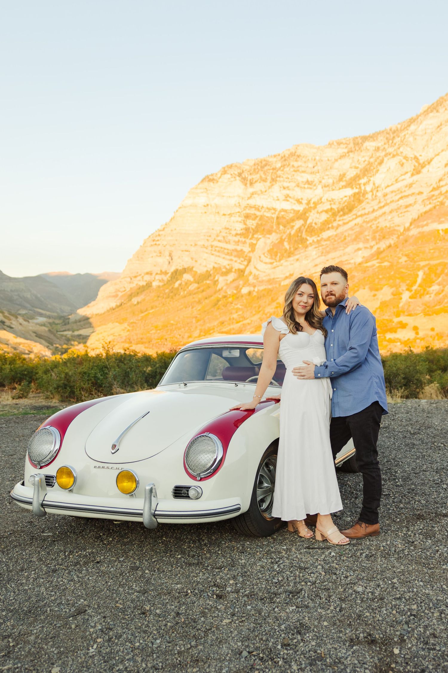 Couple kissing with vintage Porsche Kyhv Peak in Provo photography by Av Potter Photo a Utah wedding and lifestyle photographer