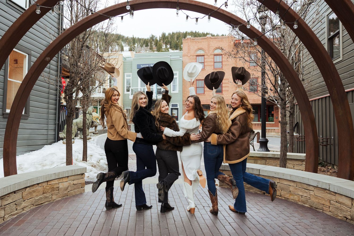 Bachelorette weekend at Park City Main Street, Utah in winter photography by Av Potter Photo a Utah wedding and lifestyle photographer