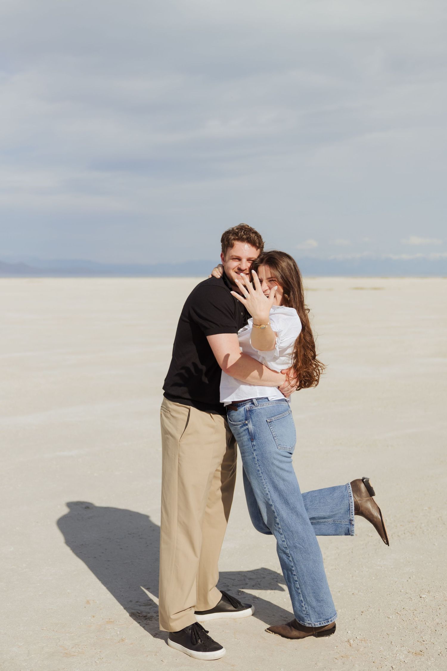 Helicopter Proposal at Stansbury Island in Utah photography by Av Potter Photo a Utah wedding and lifestyle photographer