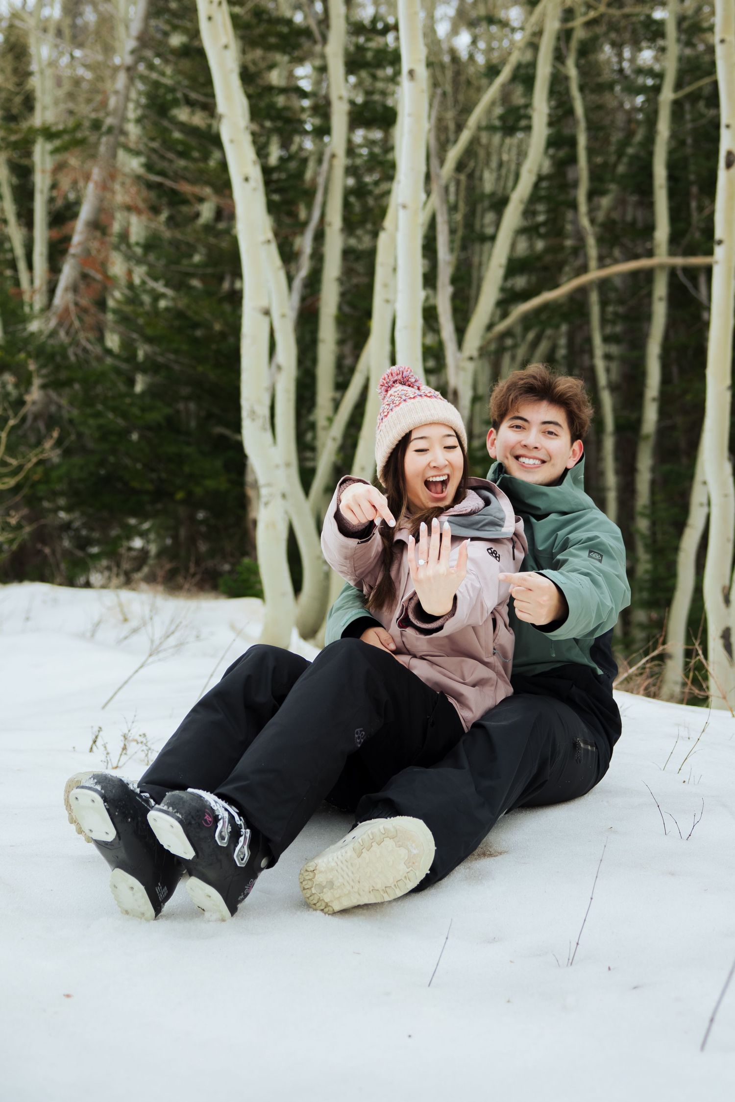 Winter engagements in ski attire at Snowbird Resort photography by Av Potter Photo a Utah wedding and lifestyle photographer