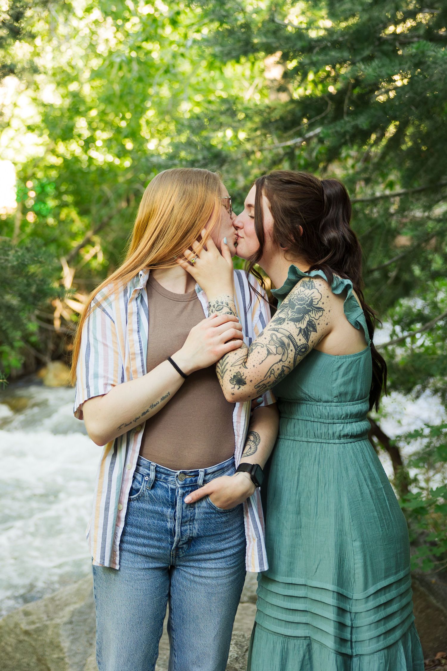 Lesbian couple kissing at Ledgemere Campground Area photography by Av Potter Photo a Utah wedding and lifestyle photographer