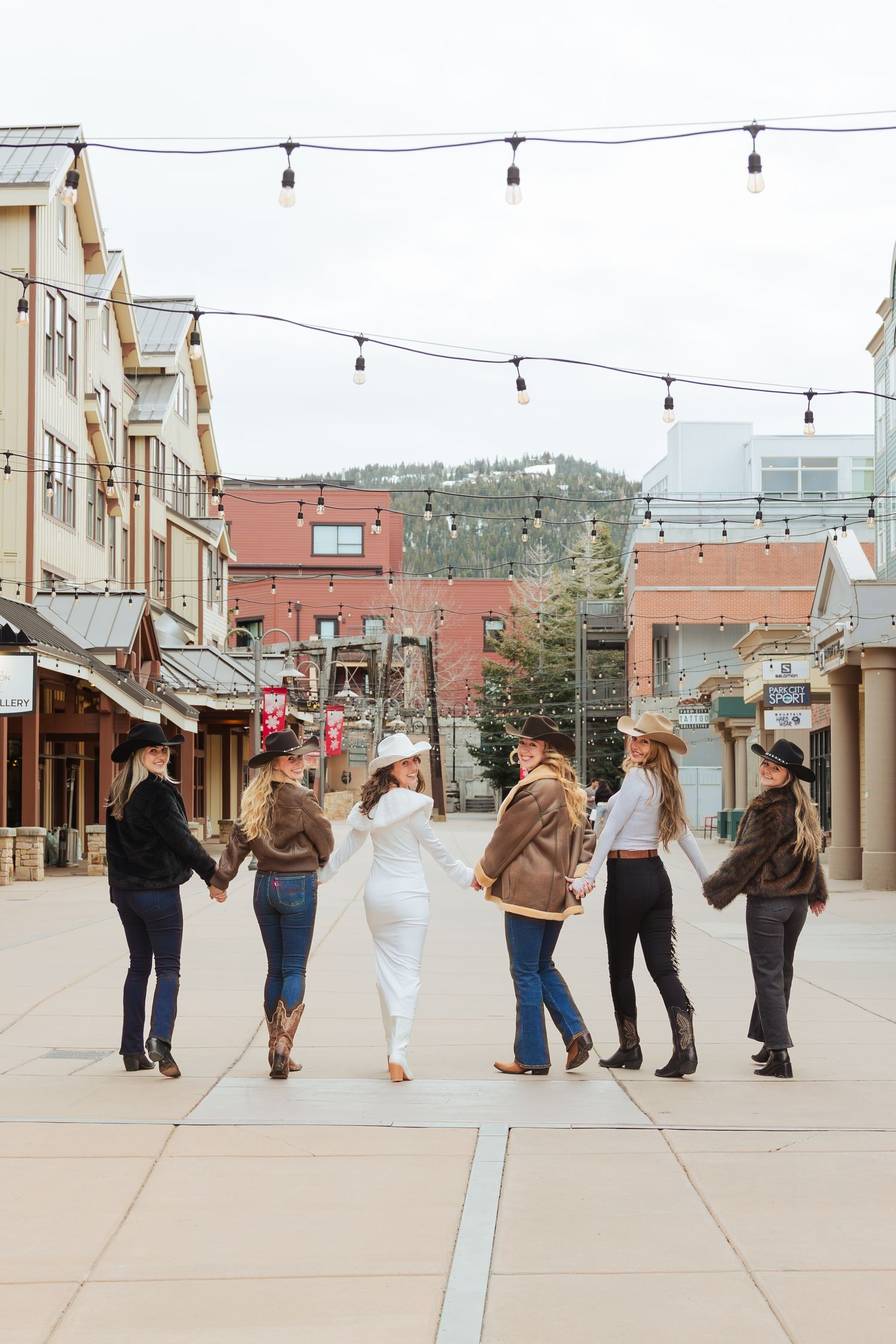 Bachelorette weekend at Park City Main Street, Utah in winter photography by Av Potter Photo a Utah wedding and lifestyle photographer