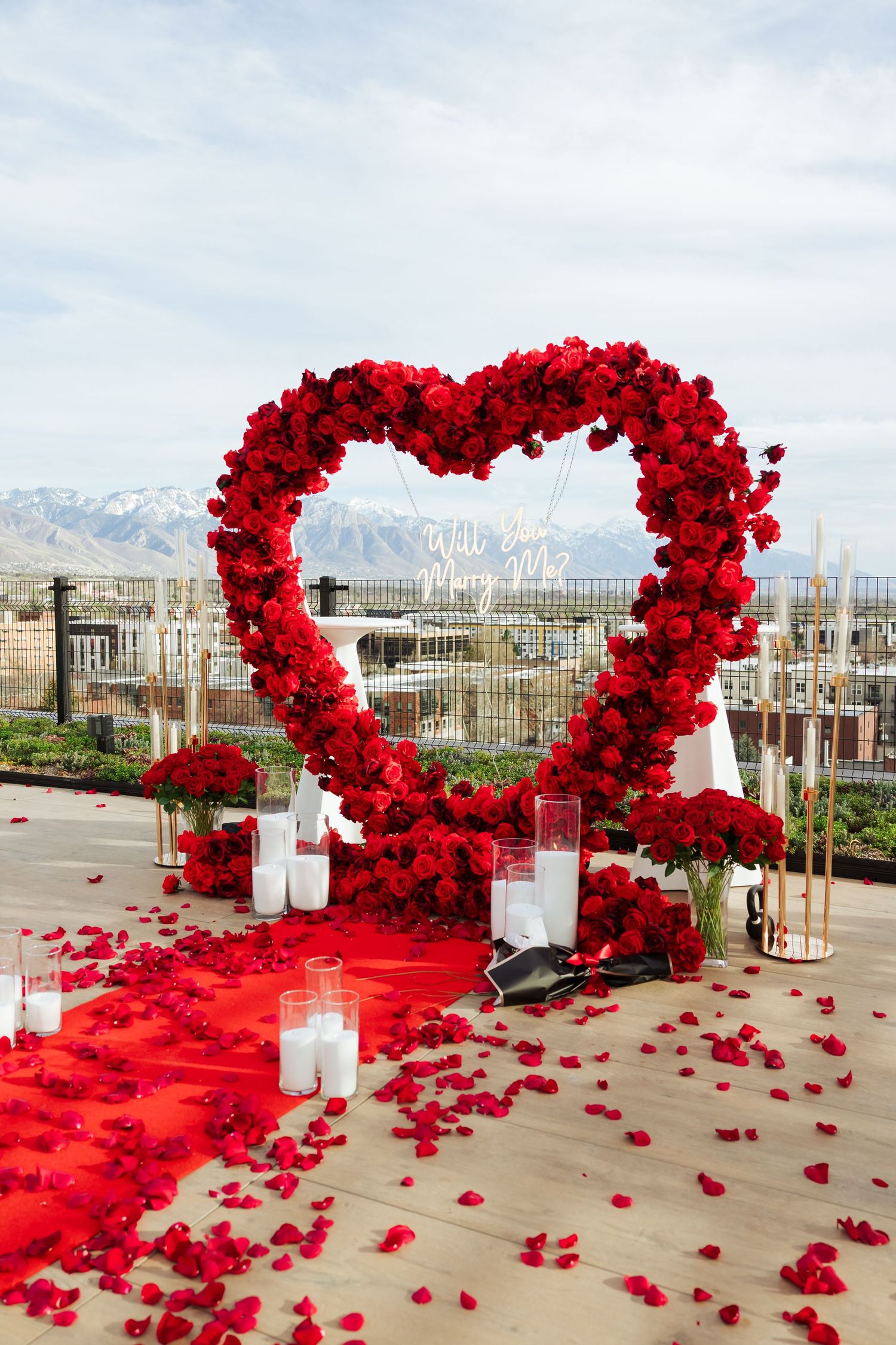Proposal on rooftop in Downtown Salt Lake City, Utah photography by Av Potter Photo a Utah wedding and lifestyle photographer