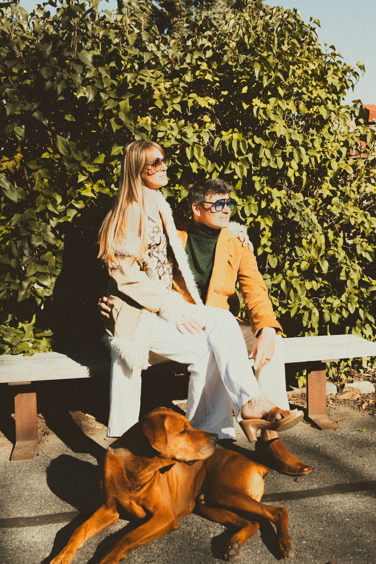 Couple with dog at Gigal Sculpture Garden photography by Av Potter Photo a Utah wedding and lifestyle photographer