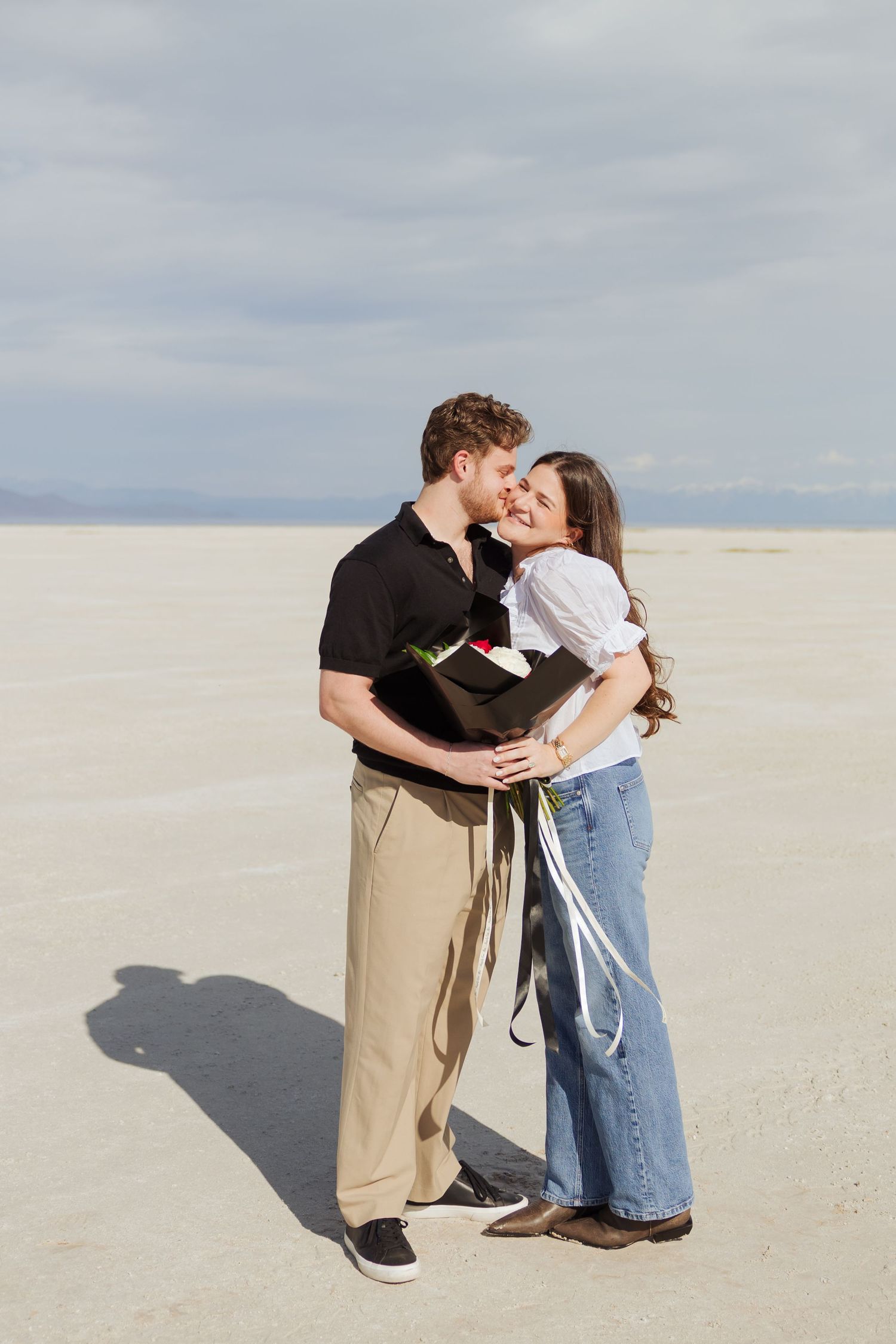 Helicopter Proposal at Stansbury Island in Utah photography by Av Potter Photo a Utah wedding and lifestyle photographer