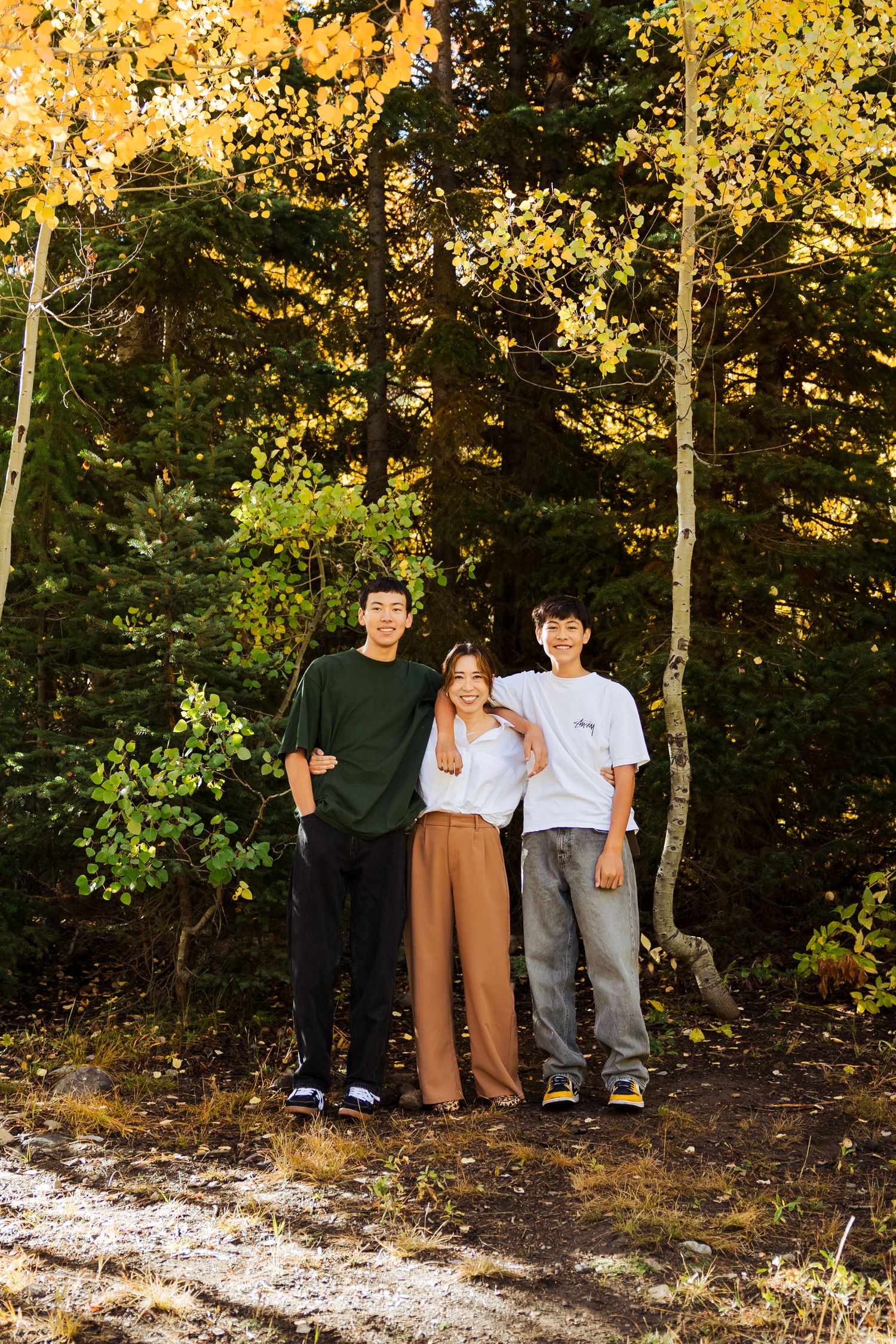 Family at Jordan Pines Campground during fall photography by Av Potter Photo a Utah wedding and lifestyle photographer