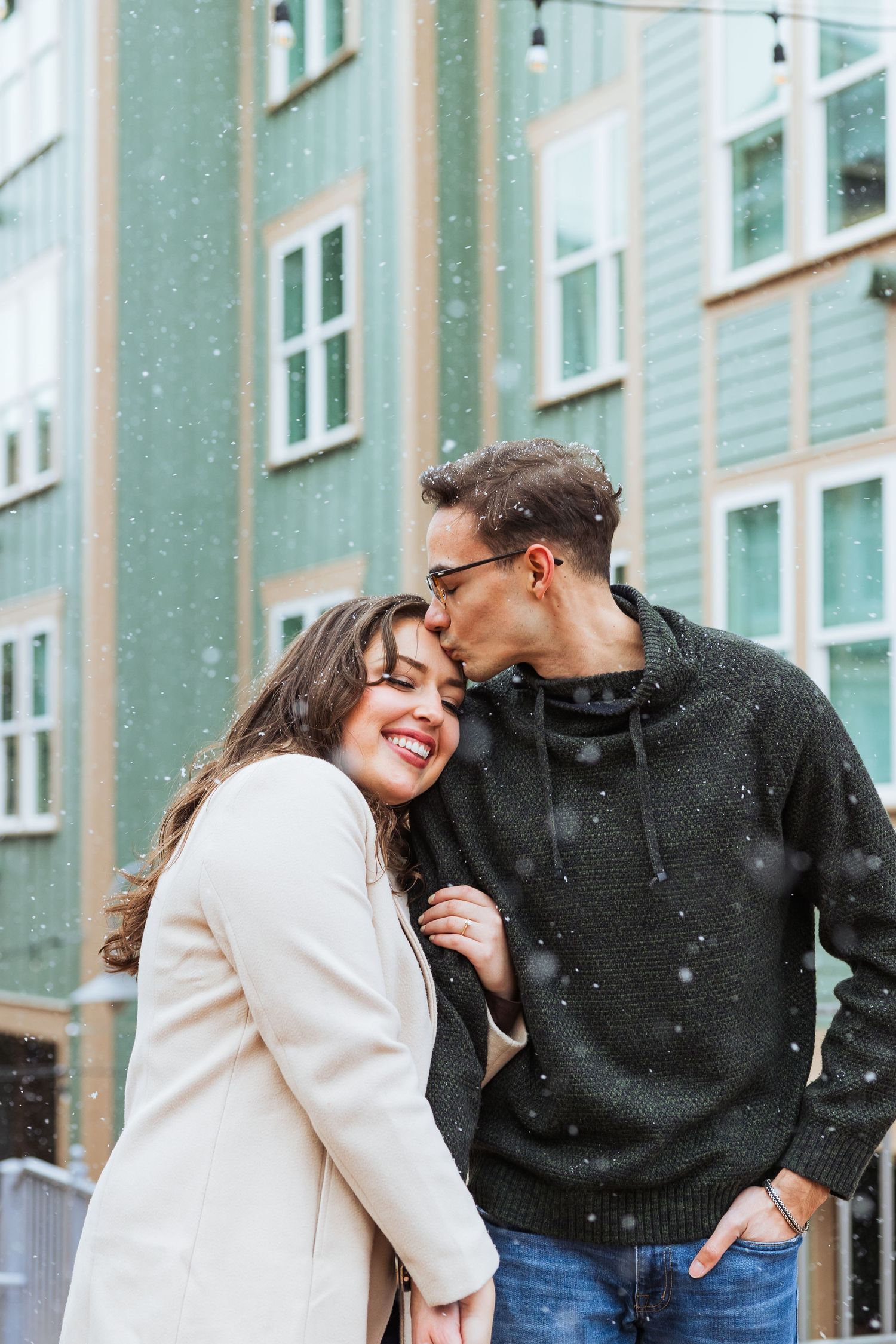 Couple during winter at Park City Main Street photography by Av Potter Photo a Utah wedding and lifestyle photographer