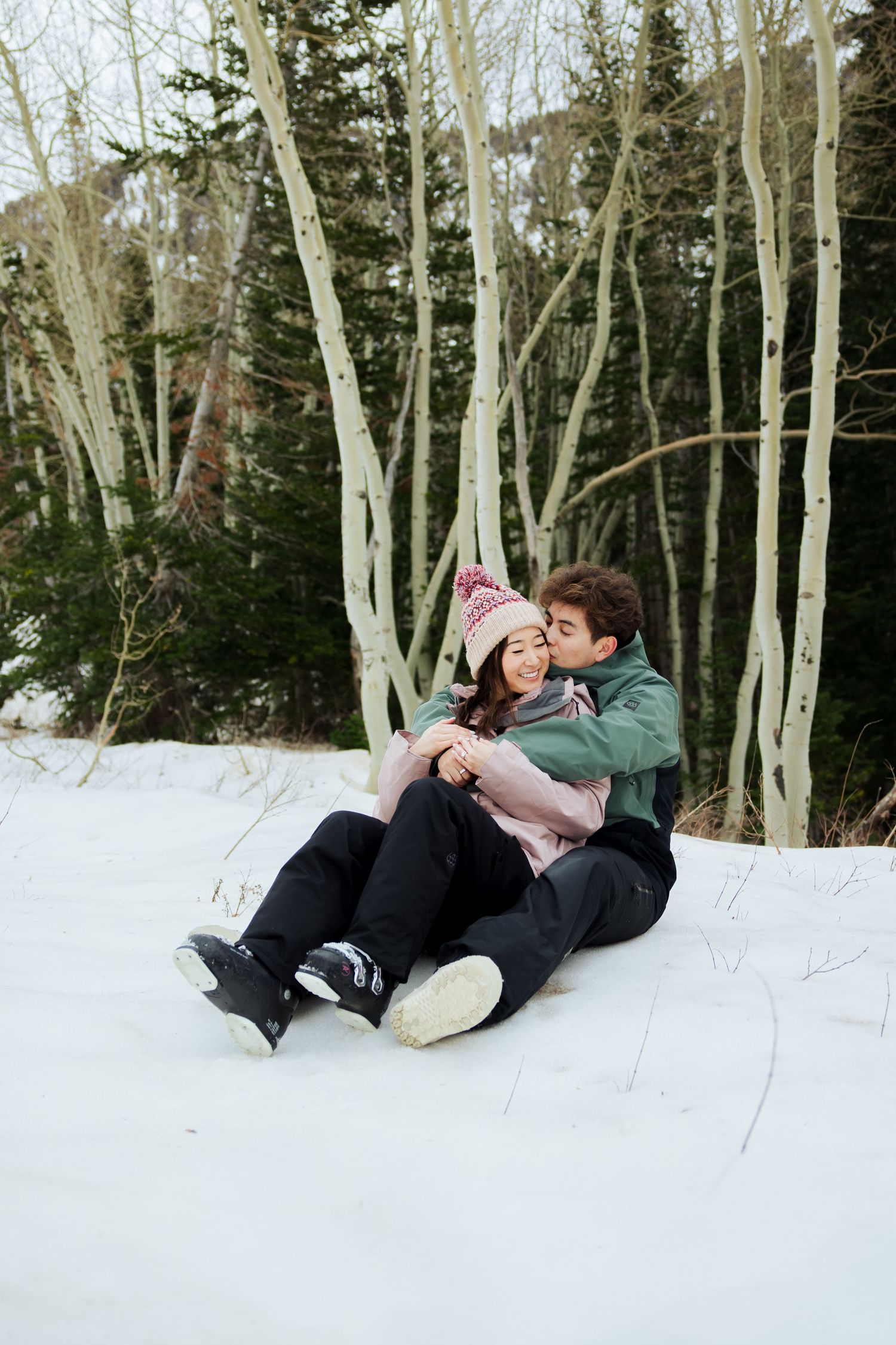 Winter engagements in ski attire at Snowbird Resort photography by Av Potter Photo a Utah wedding and lifestyle photographer