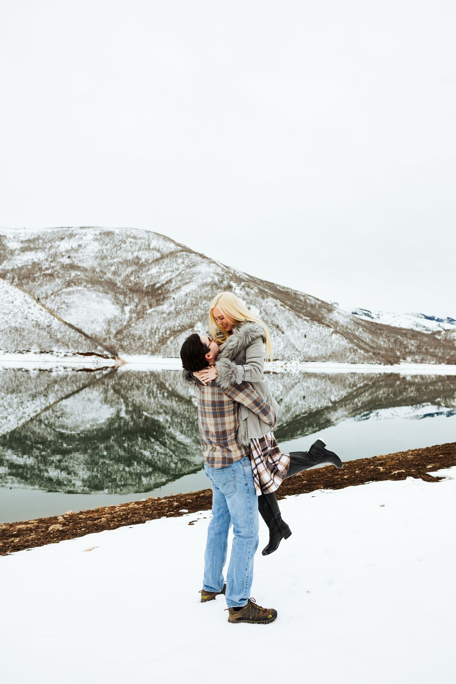 Winter engagement at Little Dell Reservoir photography by Av Potter Photo a Utah wedding and lifestyle photographer