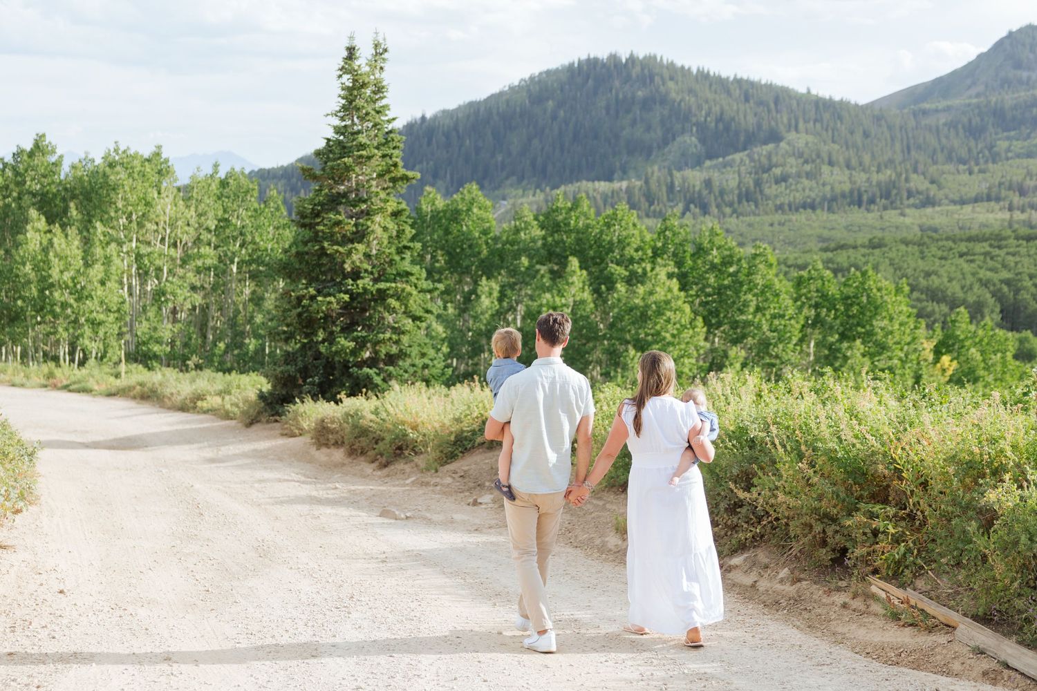 Family walking at Guardsman Pass photography by Av Potter Photo a Utah wedding and lifestyle photographer