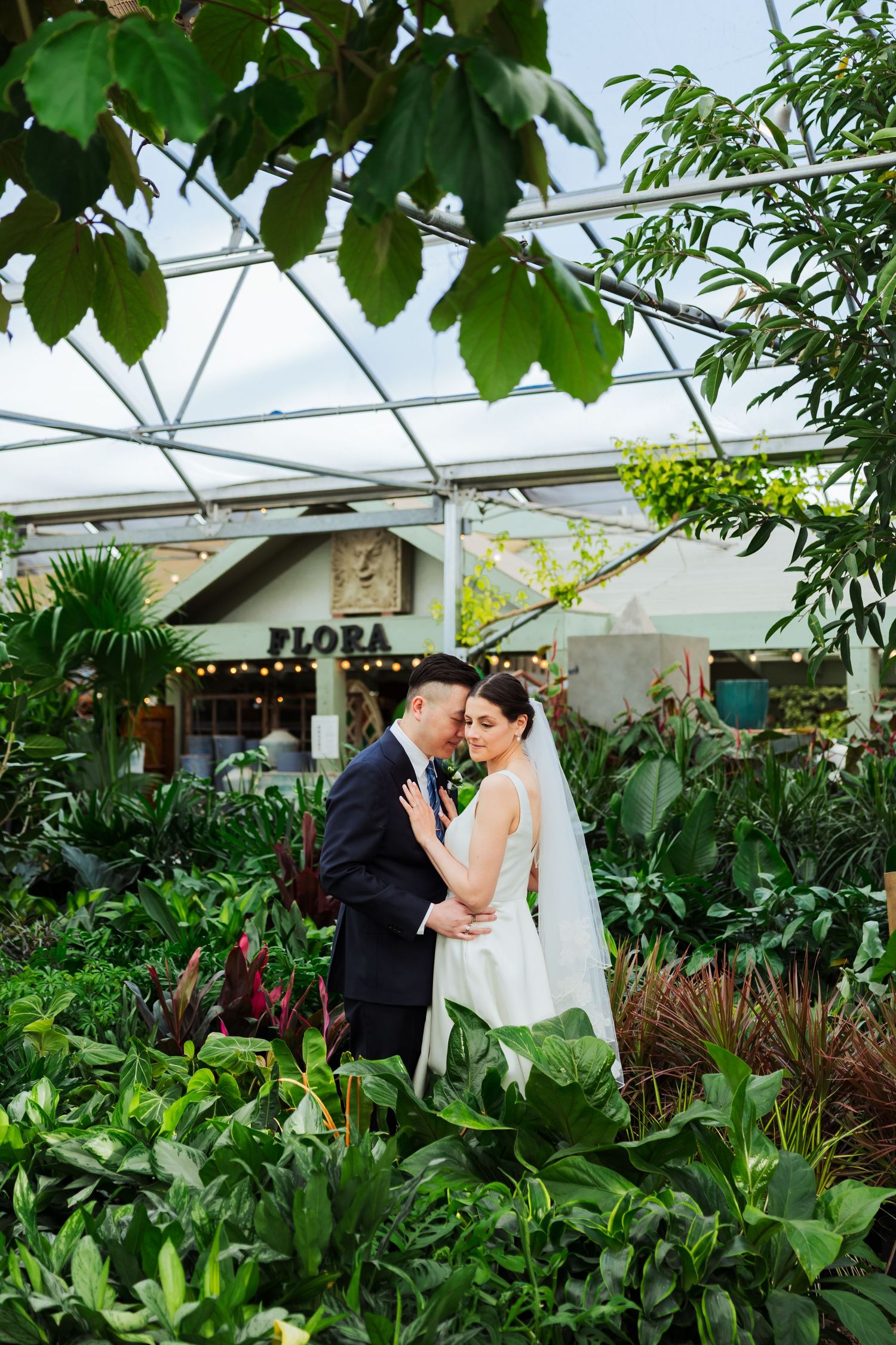 Bride and groom at Cactus and Tropicals in Salt Lake City photography by Av Potter Photo a Utah wedding and lifestyle photographer