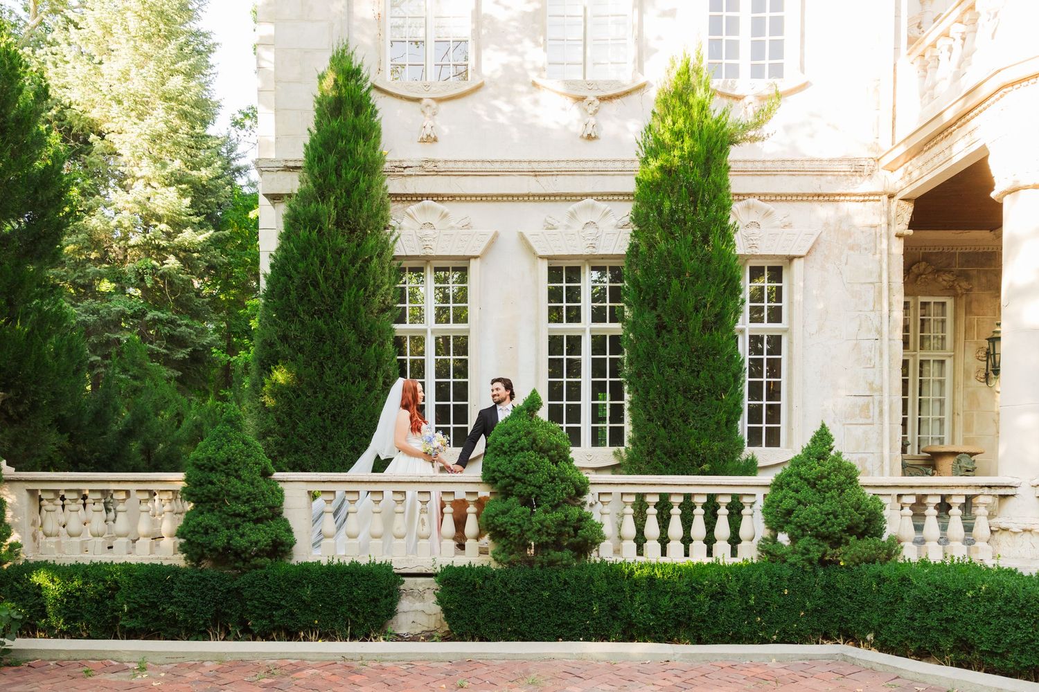 Bride and groom walking at La Caille photography by Av Potter Photo a Utah wedding and lifestyle photographer
