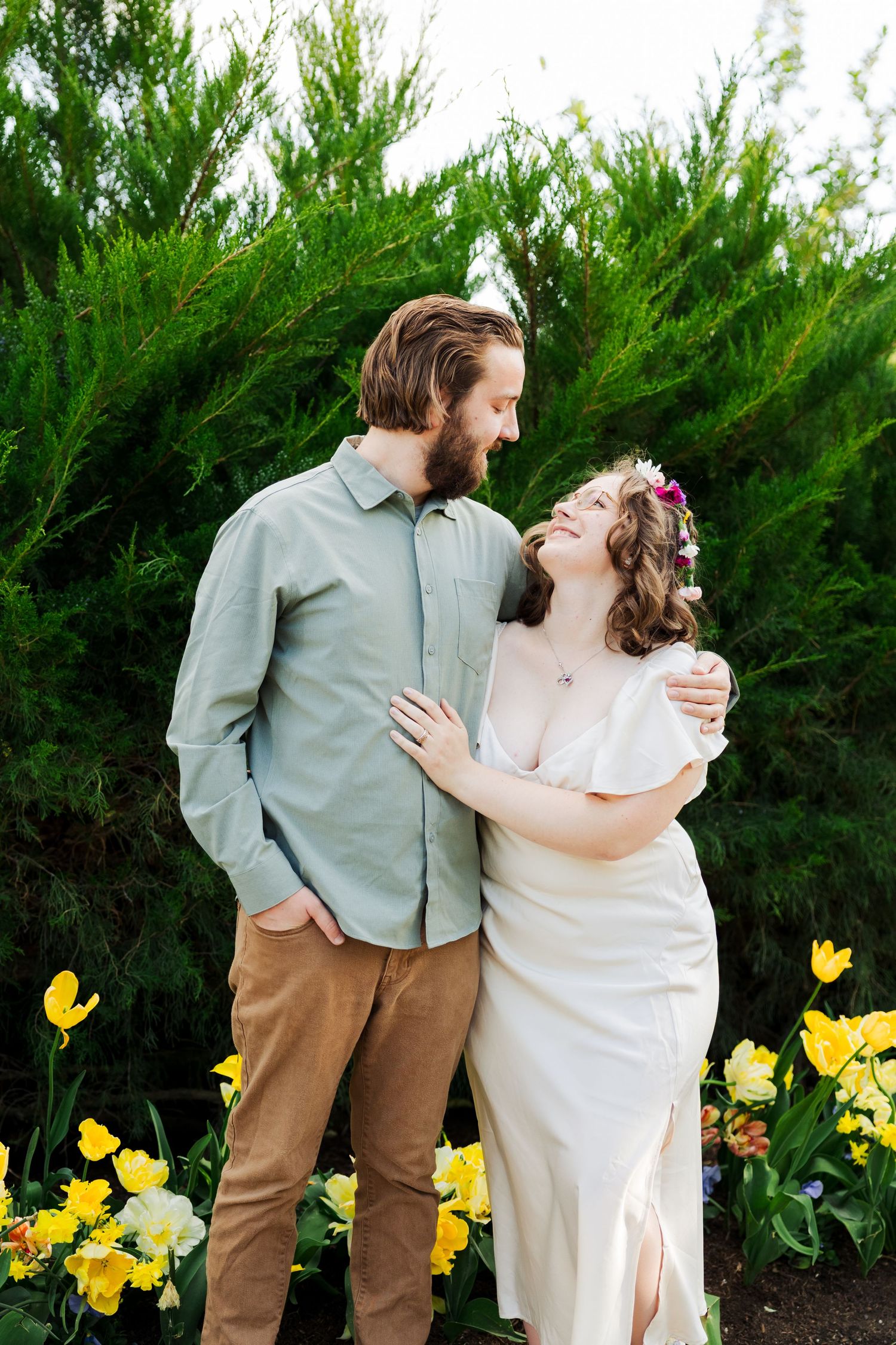 Couple at Ashton Gardens during tulip festival at Thanksgiving Point photography by Av Potter Photo a Utah wedding photographer