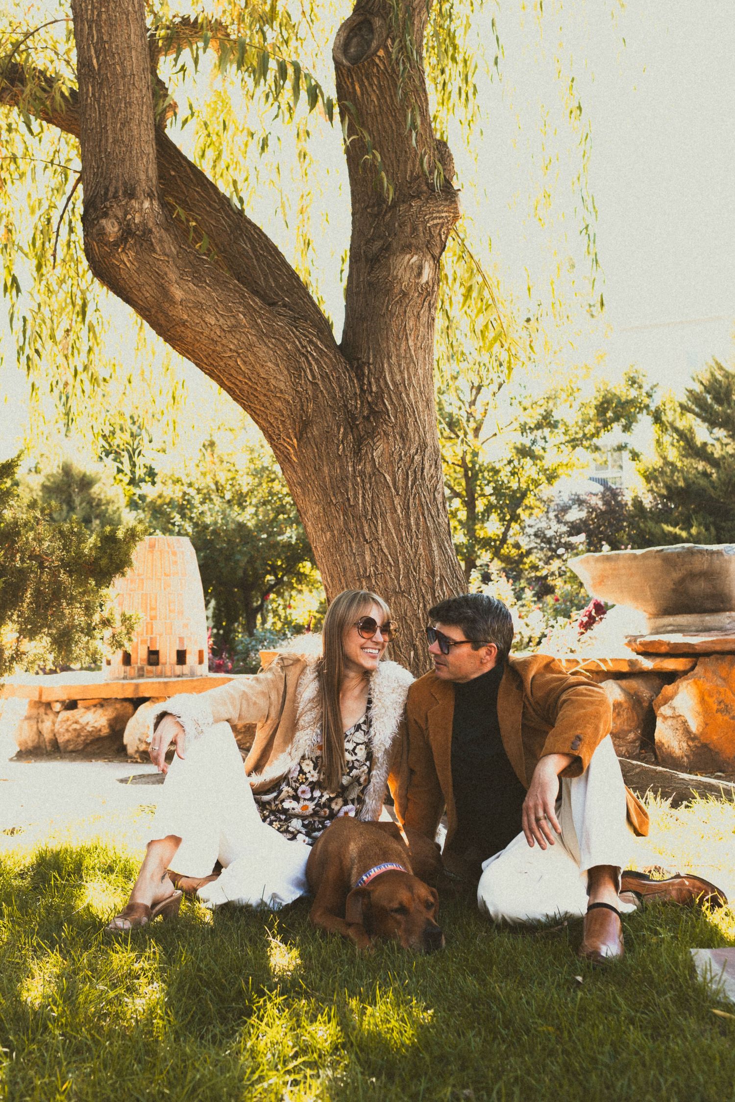 Couple with dog at Gigal Sculpture Garden photography by Av Potter Photo a Utah wedding and lifestyle photographer
