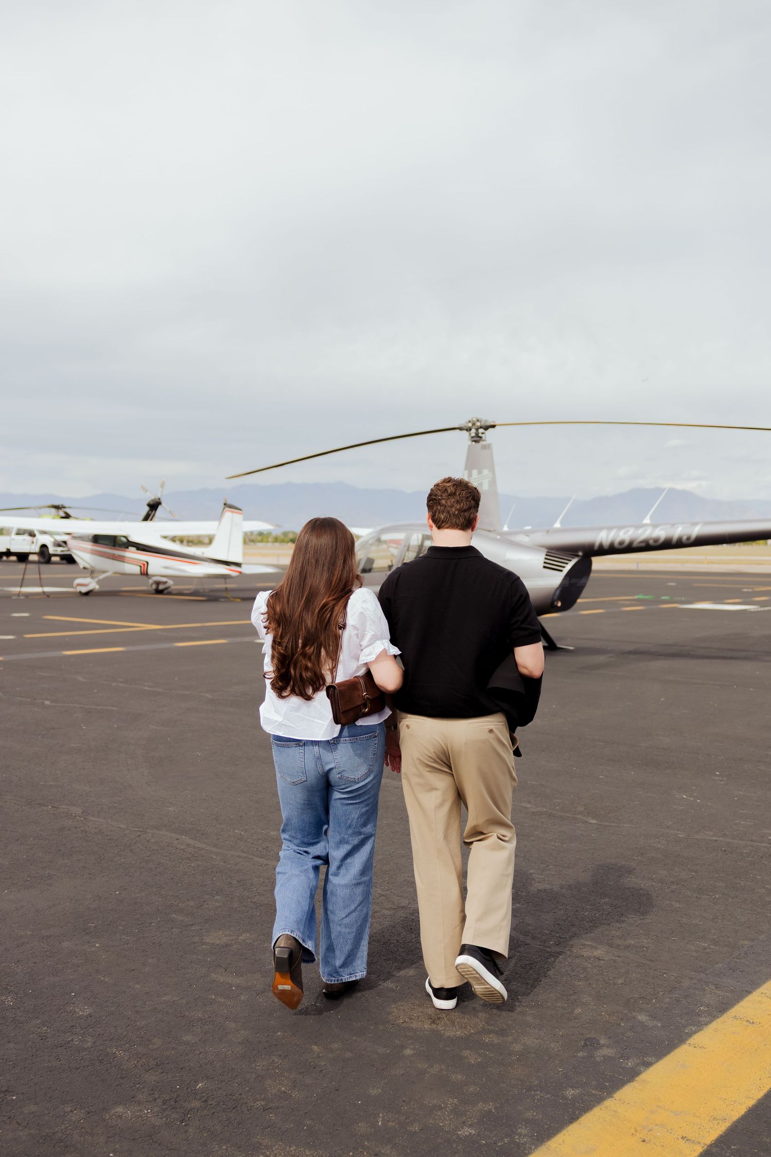 Helicopter Proposal at Stansbury Island in Utah photography by Av Potter Photo a Utah wedding and lifestyle photographer